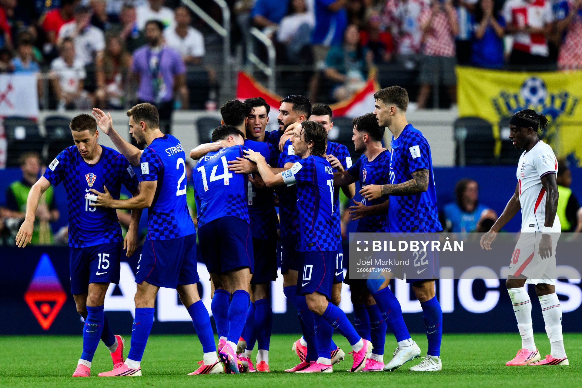 Petar Musa of Croatia celebrates scoring 2-2 with teammates