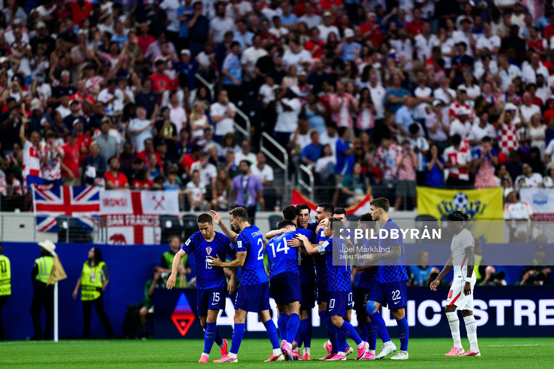 Petar Musa of Croatia celebrates scoring 2-2 with teammates