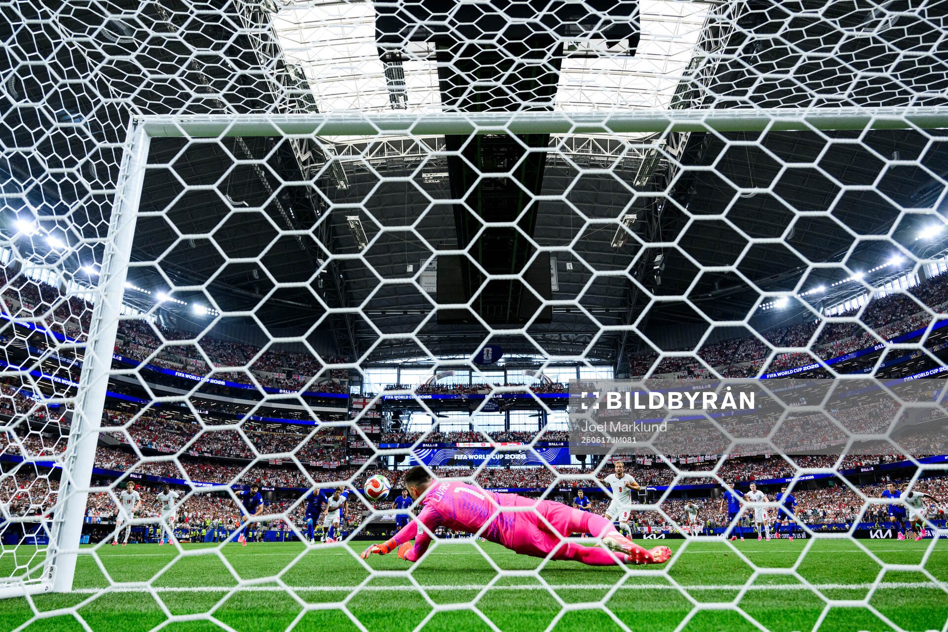 Goalkeeper Dominik Livakovic of Croatia saves a penalty