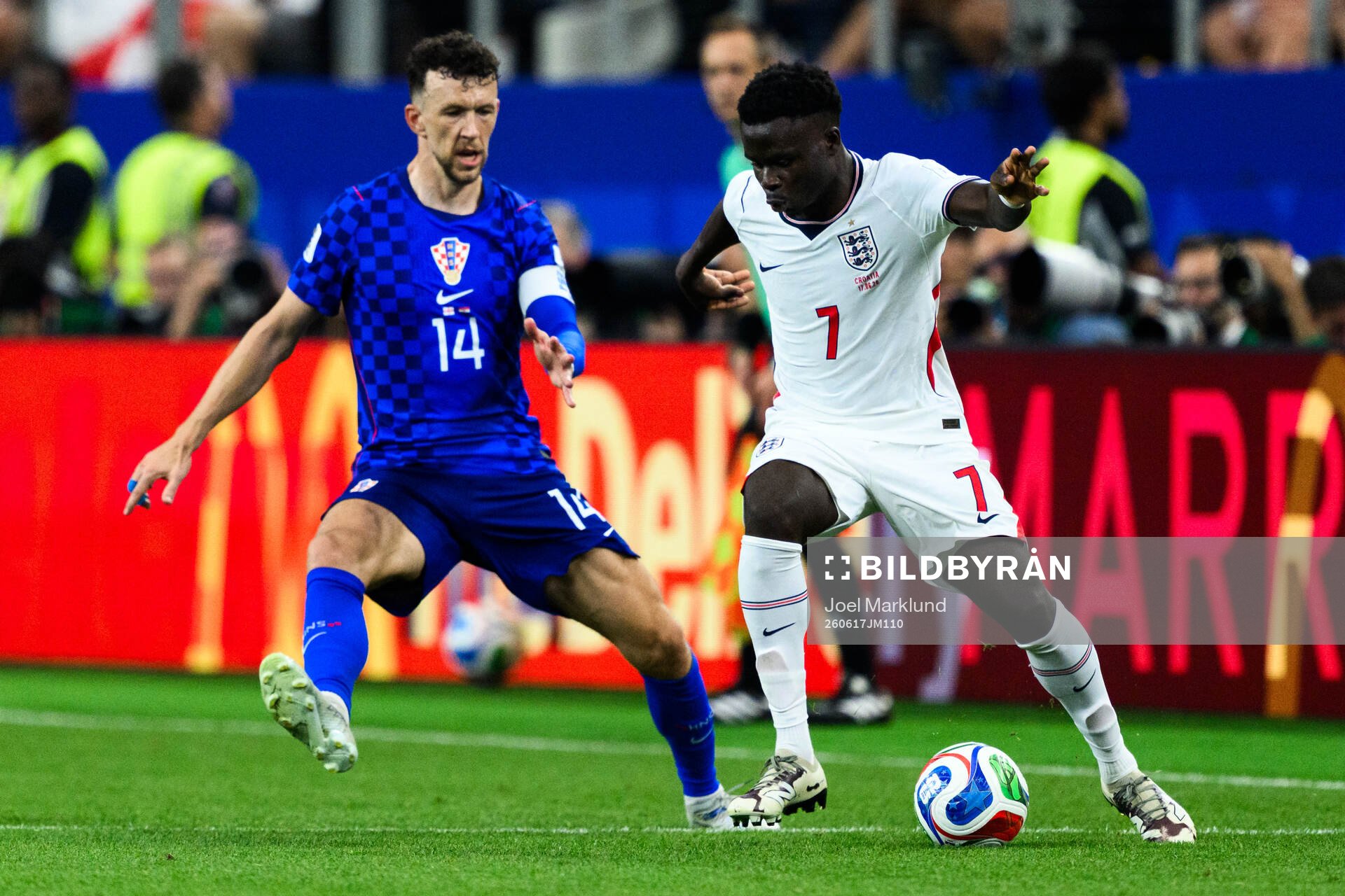 Ivan Perisic of Croatia and Bukayo Saka of England