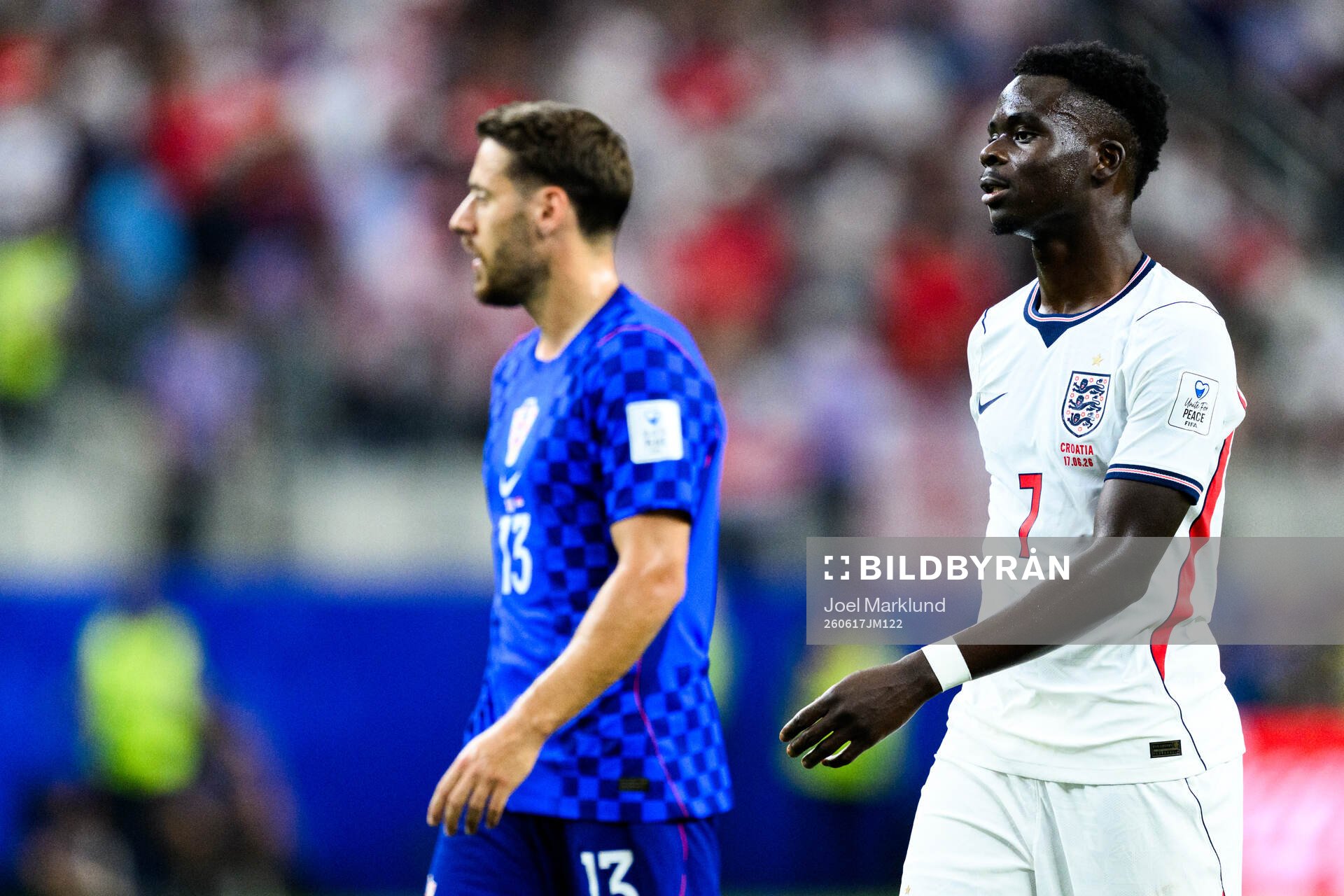 Nikola Vlasic of Croatia and Bukayo Saka of England