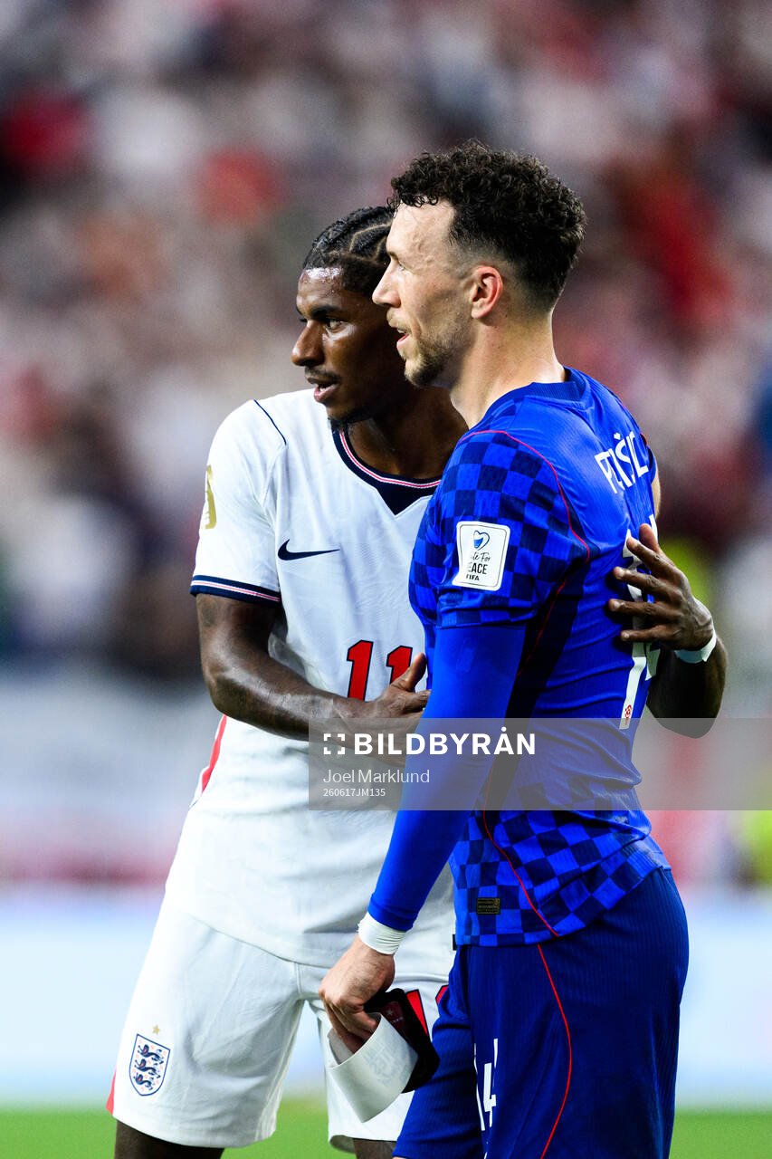 Marcus Rashford of England and Ivan Perisic of Croatia