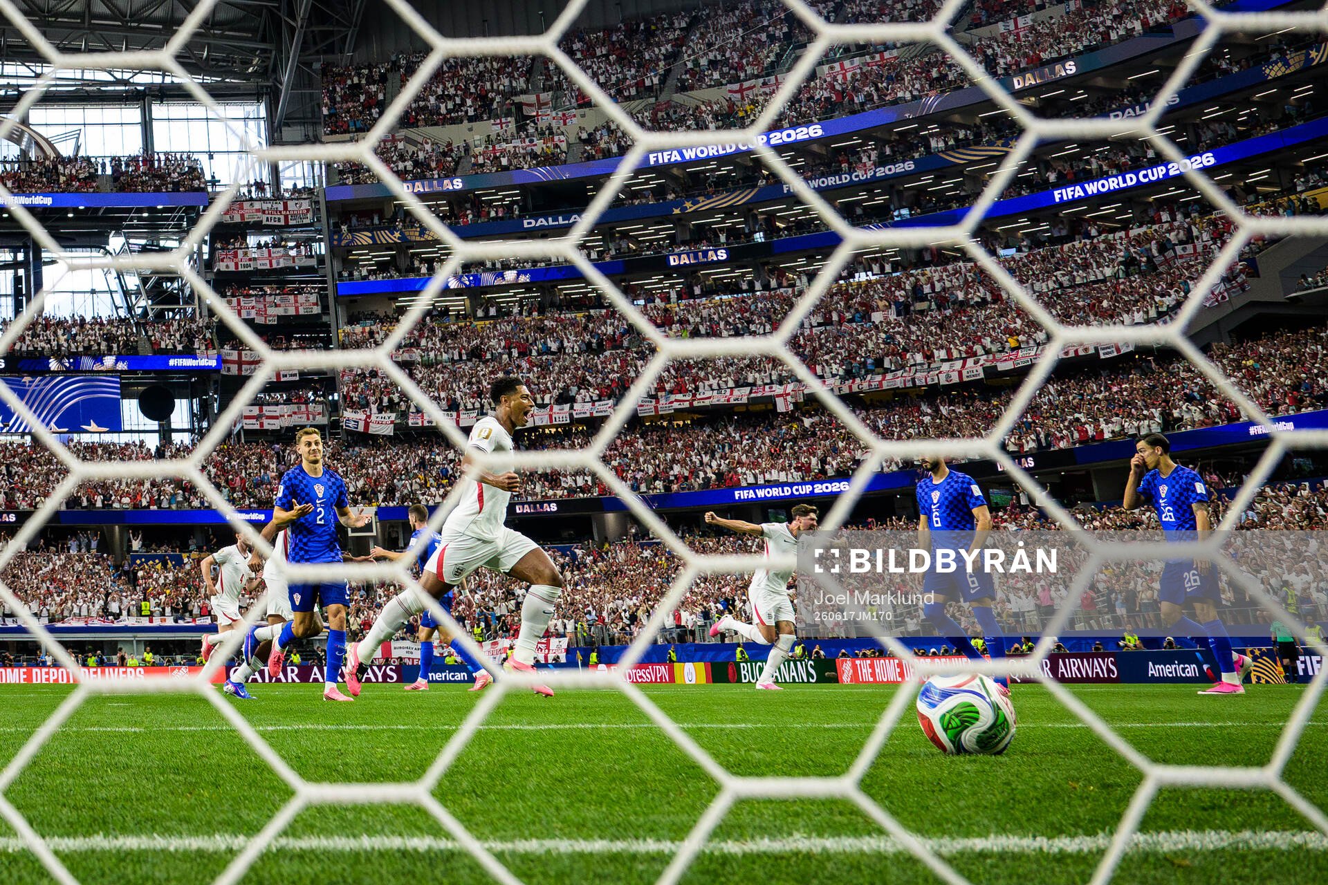 Jude Bellingham and John Stones of England celebrate the