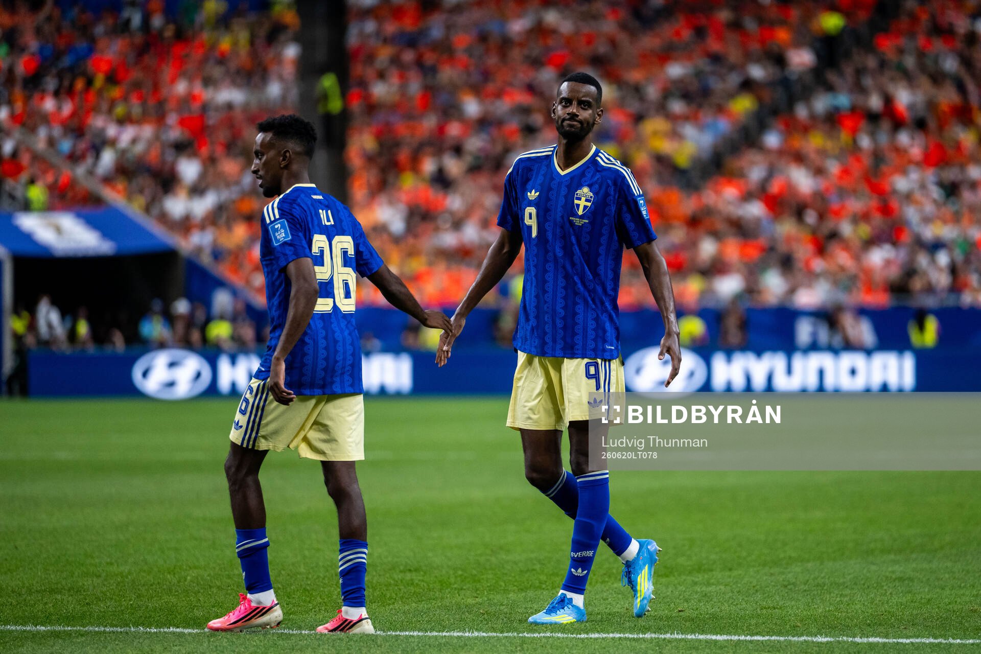 Taha Ali and Alexander Isak of Sweden