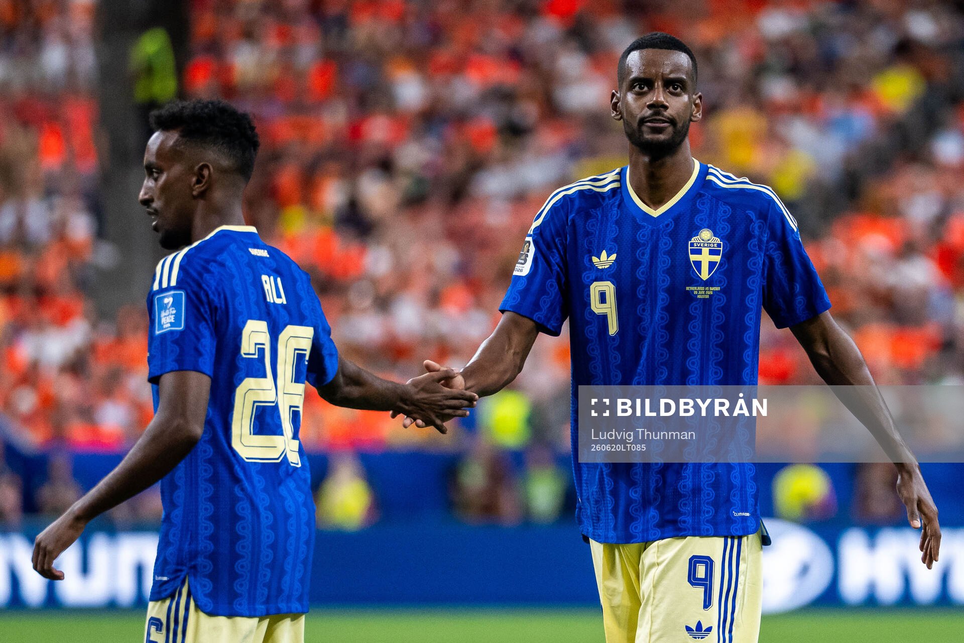 Taha Ali and Alexander Isak of Sweden
