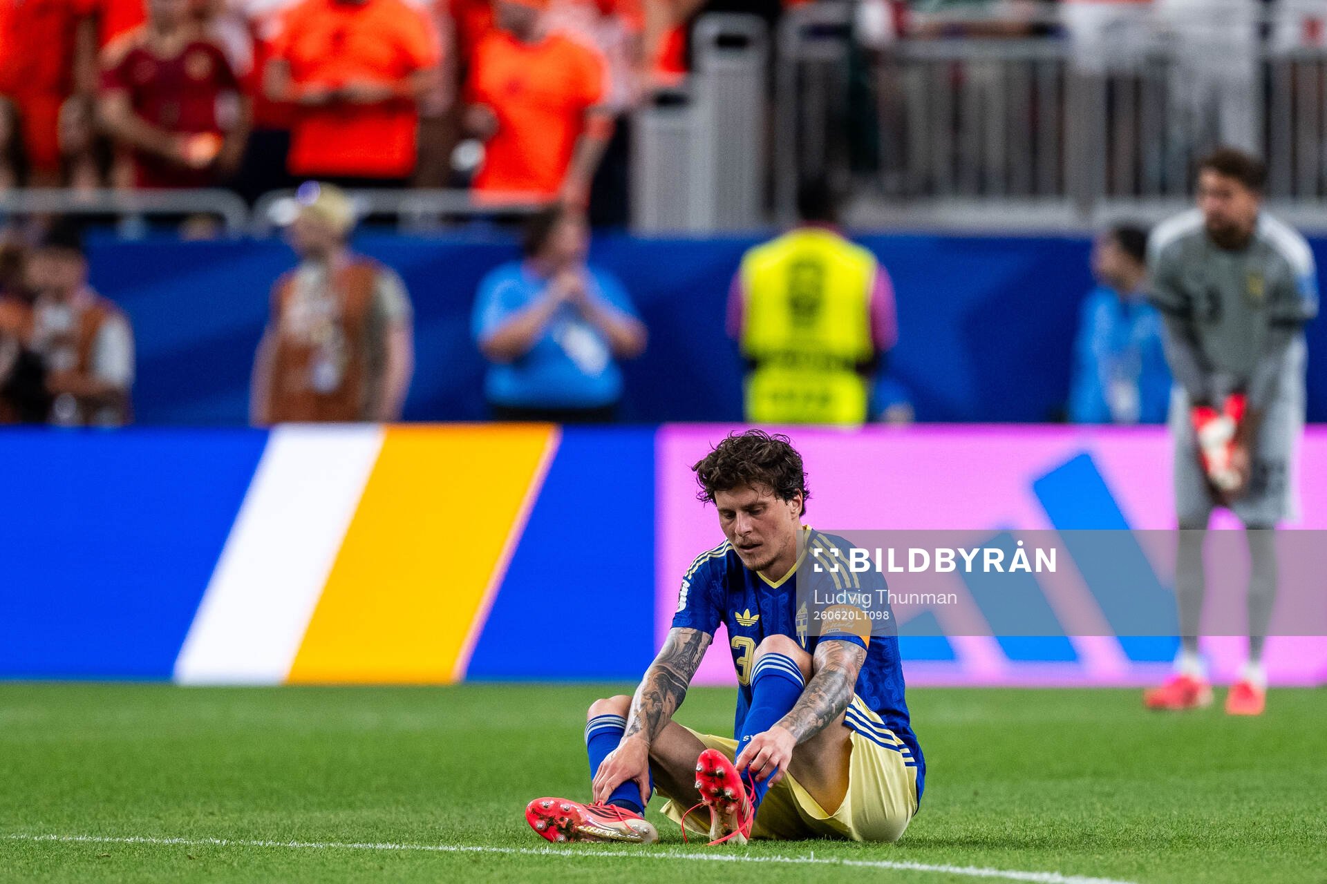 Victor Nilsson Lindelöf of Sweden looks dejected