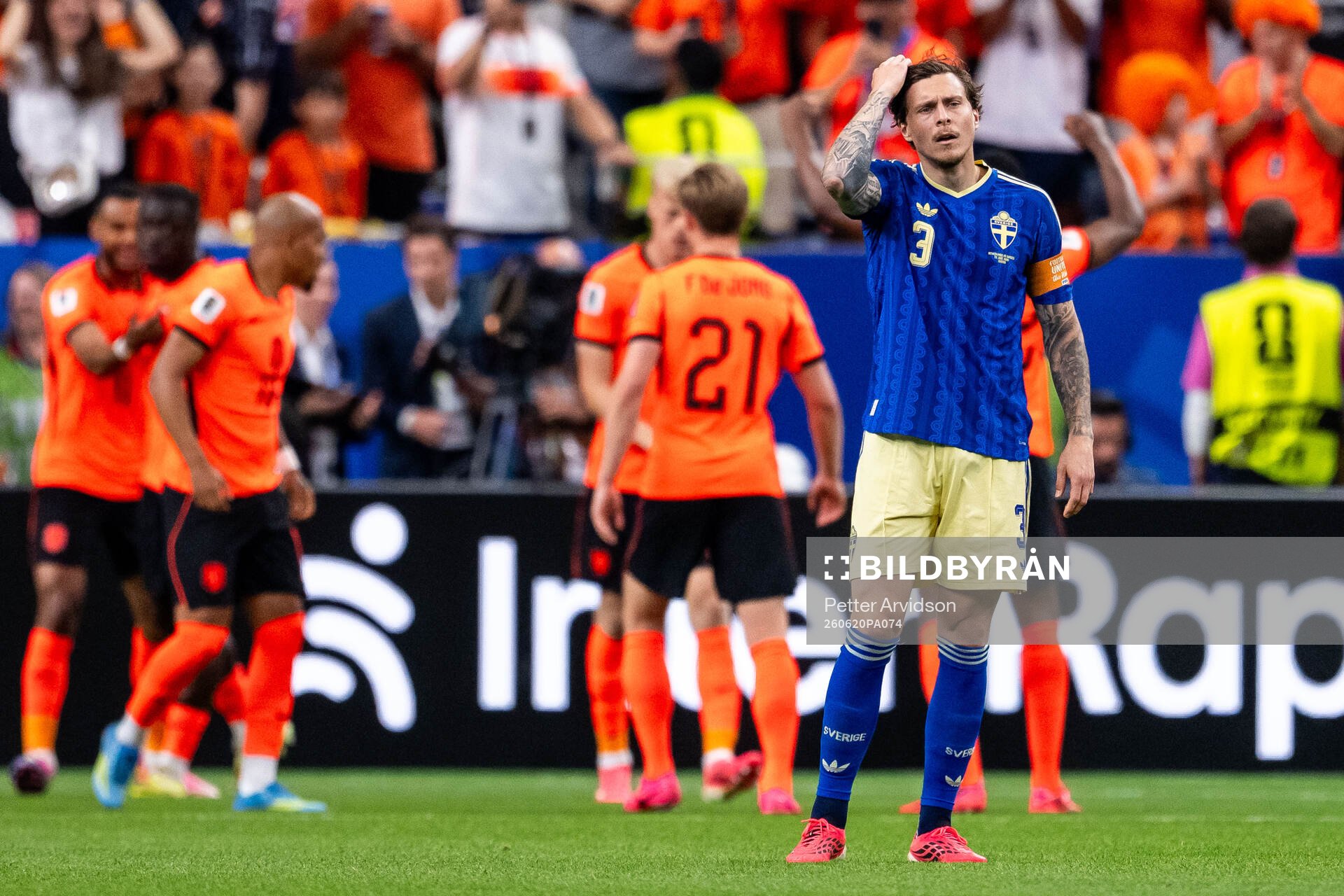 Victor Nilsson Lindelöf of Sweden looks dejected