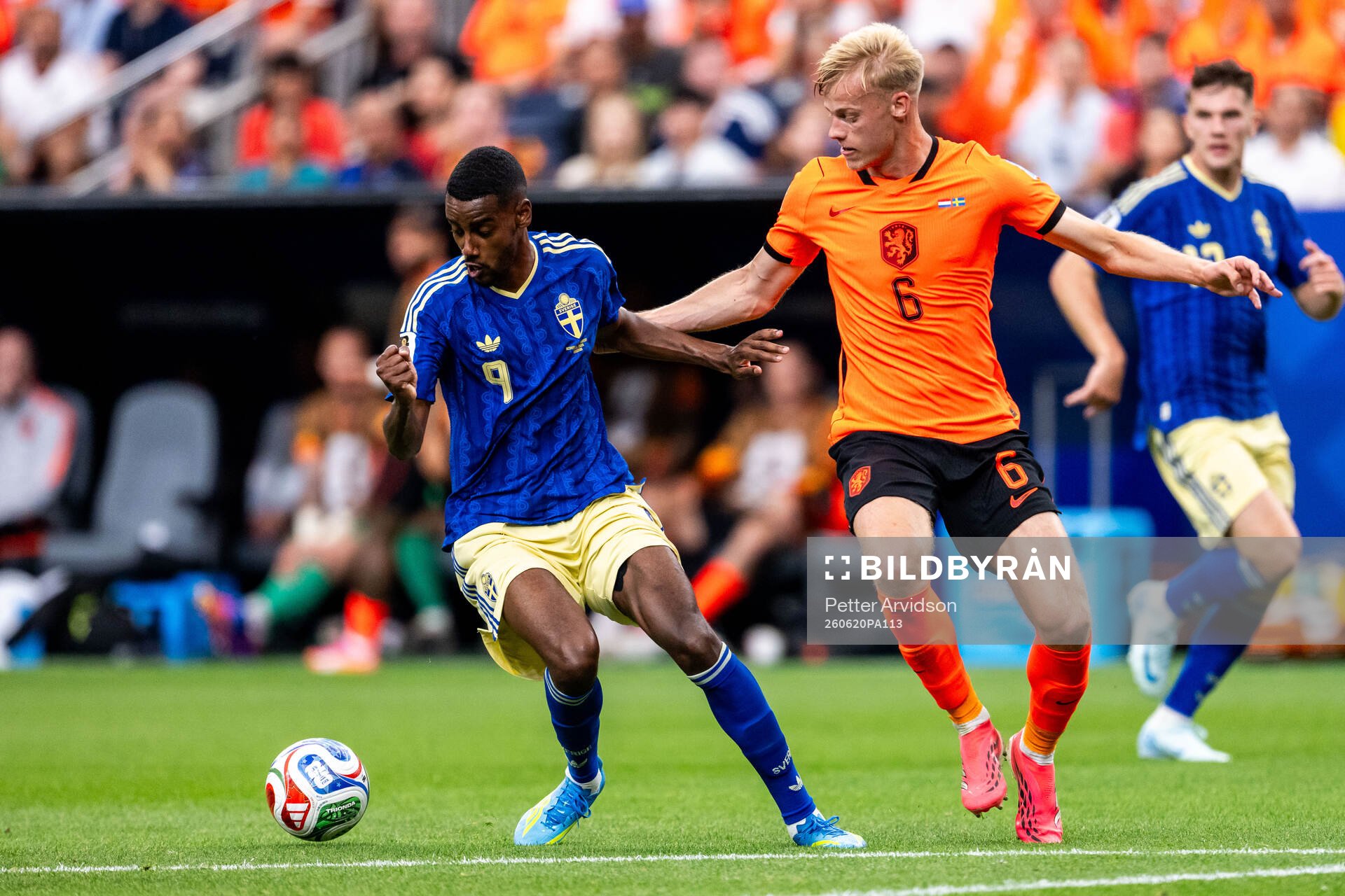 Alexander Isak of Sweden and Jan Paul Van Hecke of
