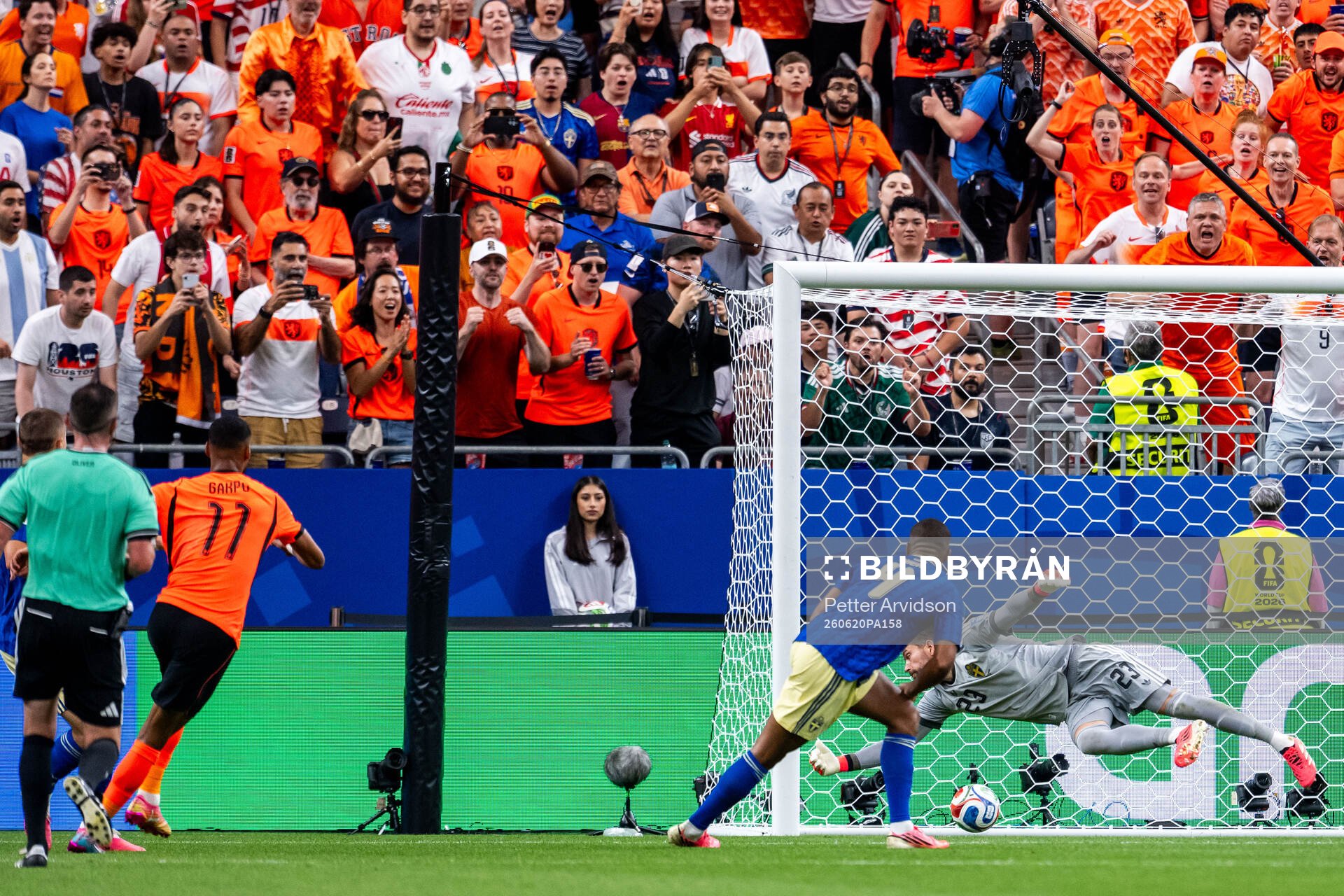Cody Gakpo of Netherlands scores 4-0 behind goalkeeper
