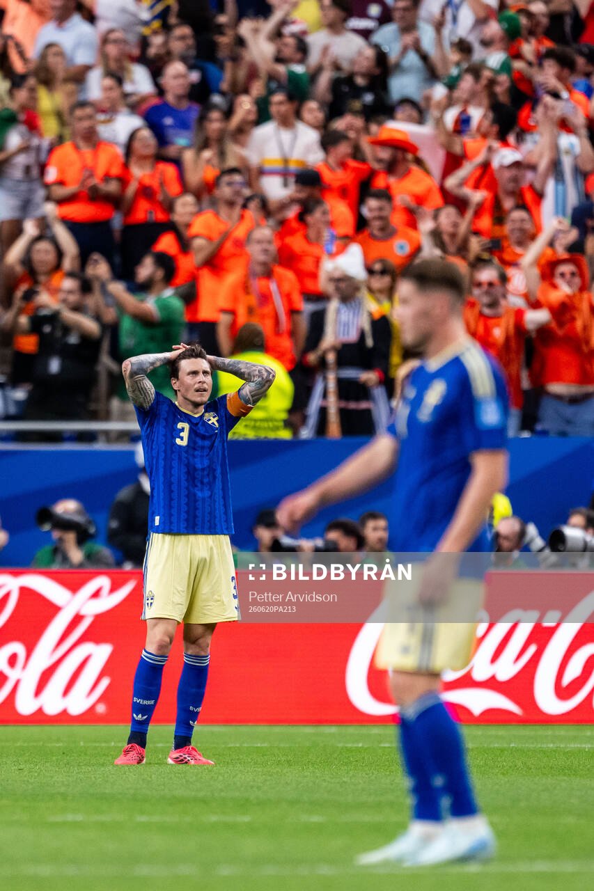 Victor Nilsson Lindelöf of Sweden looks dejected