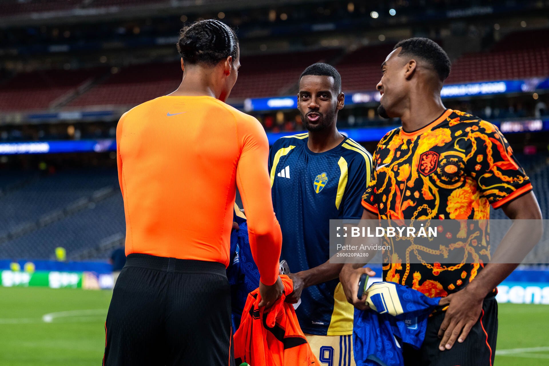 Alexander Isak of Sweden with Virgil Van Dijk and Ryan