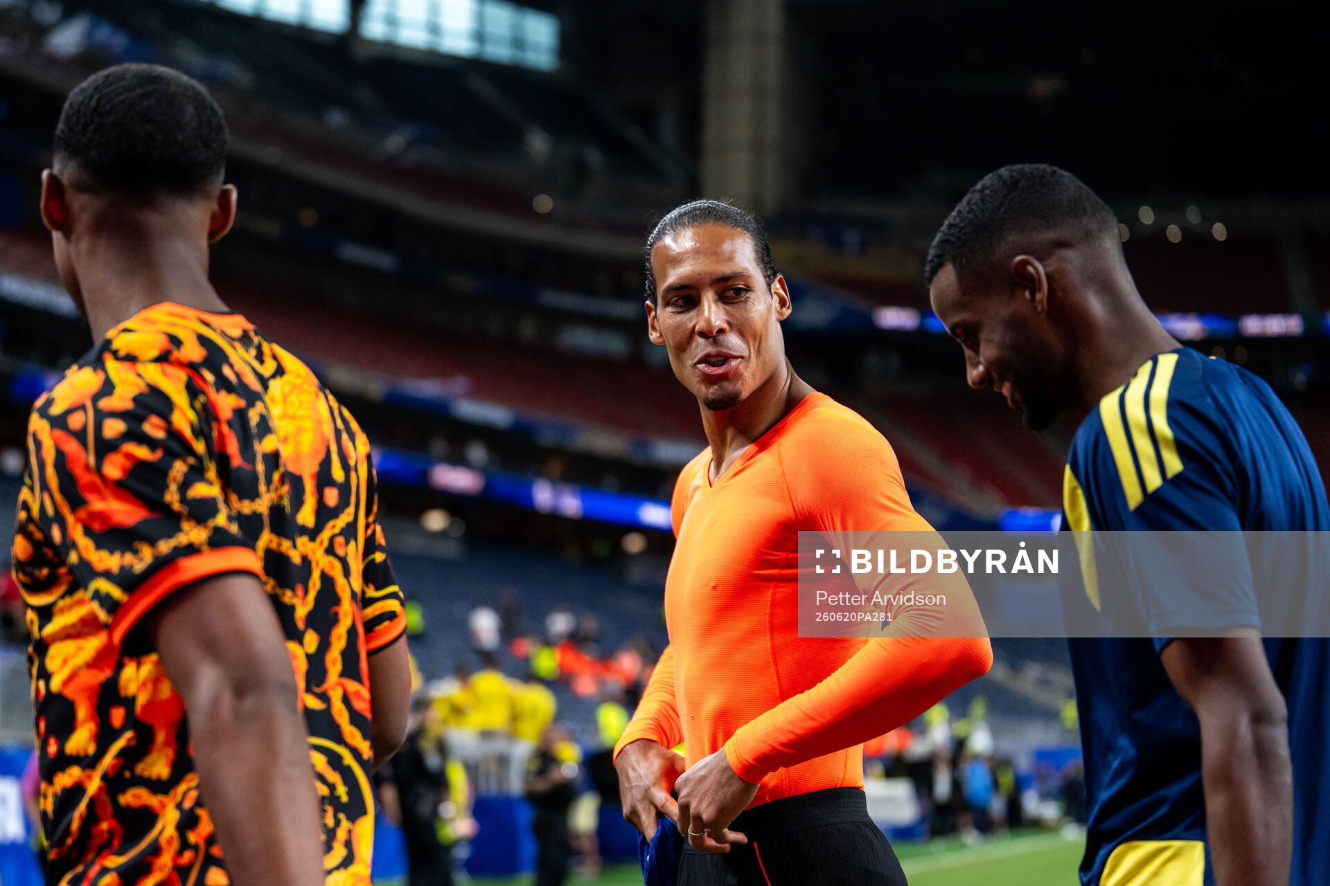 Alexander Isak of Sweden with Virgil Van Dijk and Ryan