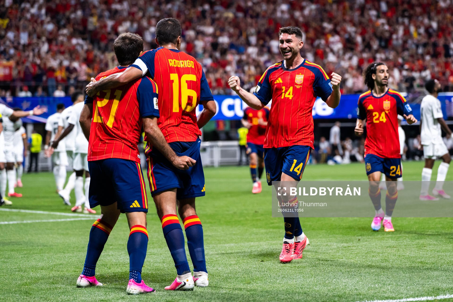 Mikel Oyarzabal of Spain celebrates with Rodri and Aymeric