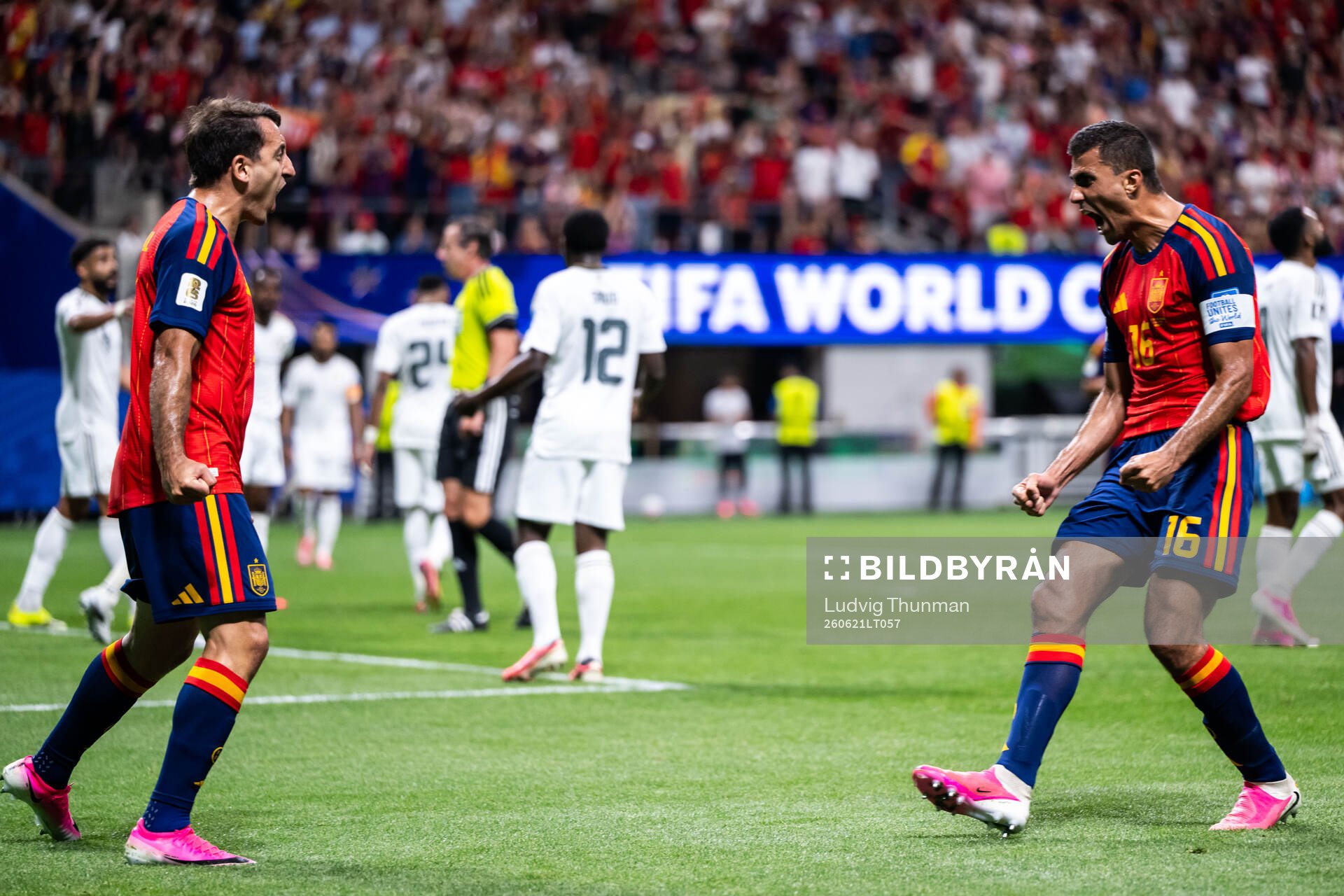 Mikel Oyarzabal of Spain celebrates with Rodri