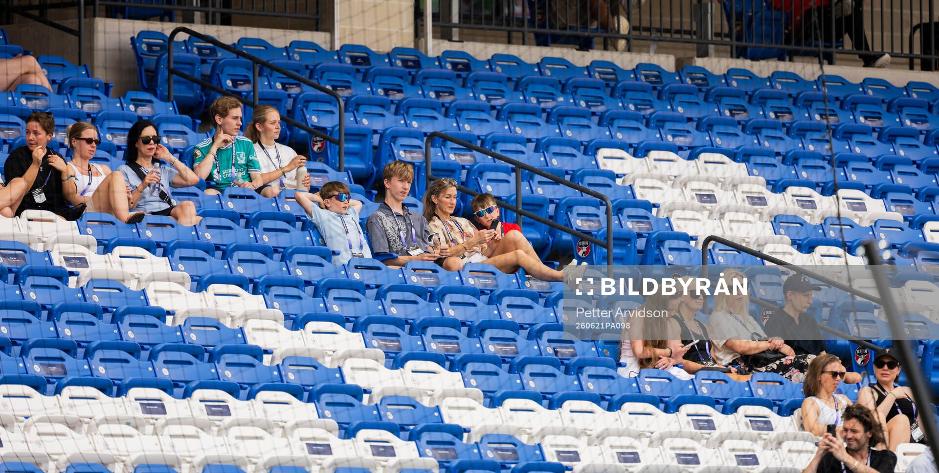 Familys in the stands at a training session with the