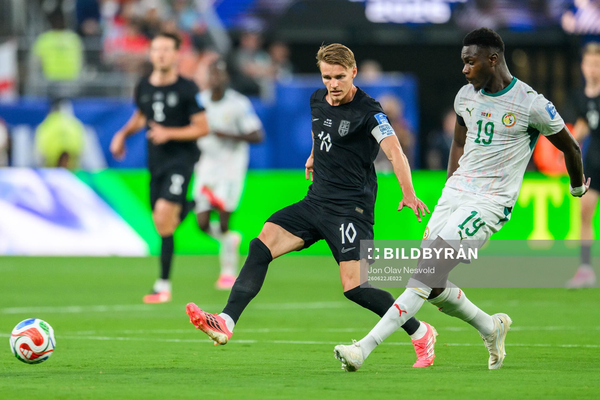 Martin Ødegaard of Norway and Moussa Niakhate of Senegal