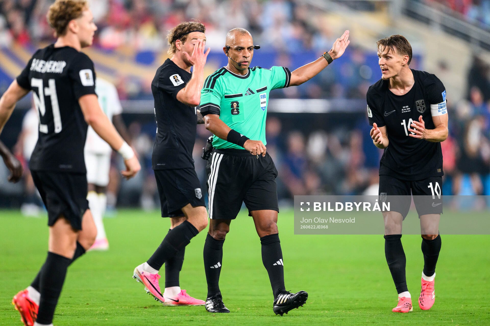 Referee Wilton Sampaio and Martin Ødegaard of Norway