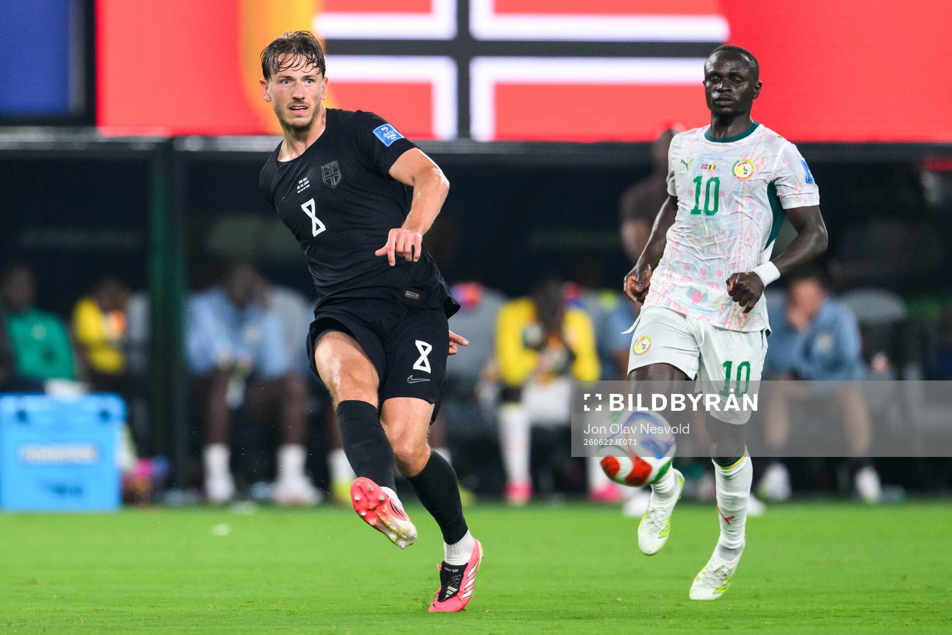 Sander Berge of Norway and Sadio Mane of Senegal