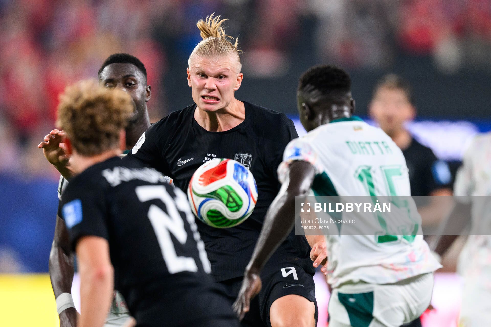 Erling Braut Haaland of Norway and Krepin Diatta of Senegal