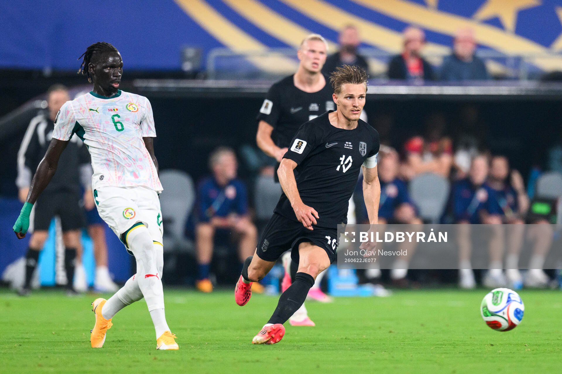Pathe Ciss of Senegal and Martin Ødegaard of Norway