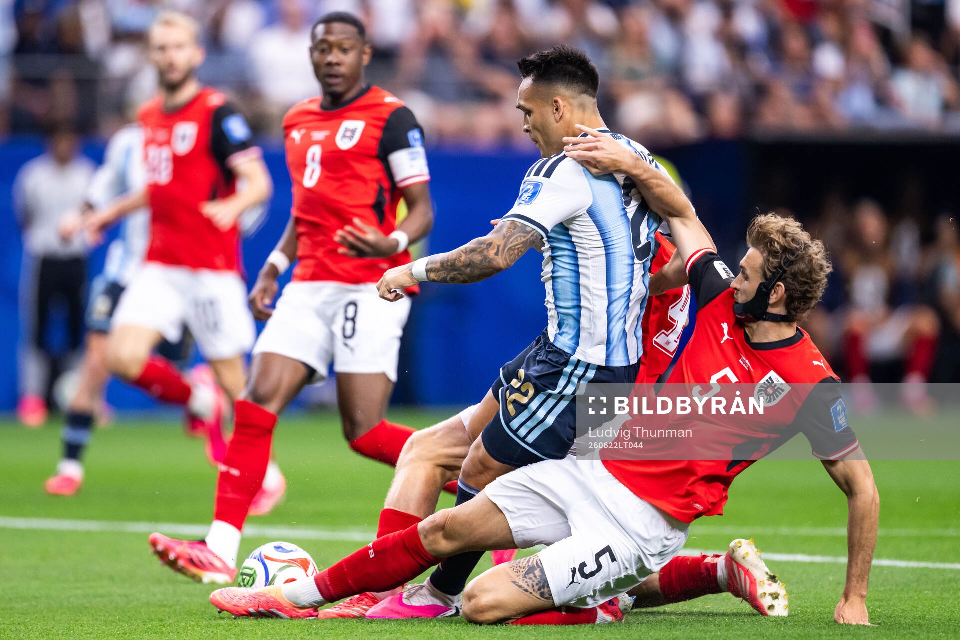 Lautaro Martinez of Argentina and Stefan Posch of Austria