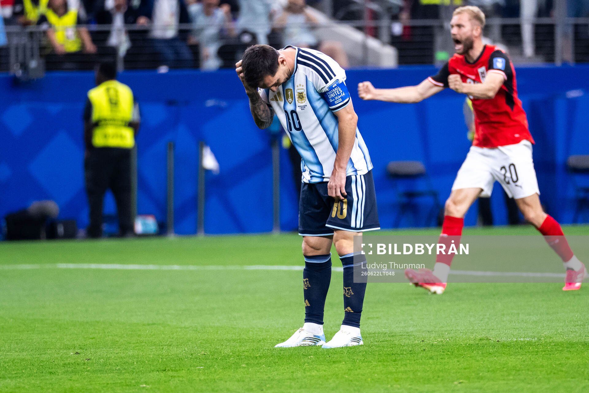 Lionel Messi of Argentina looks dejected