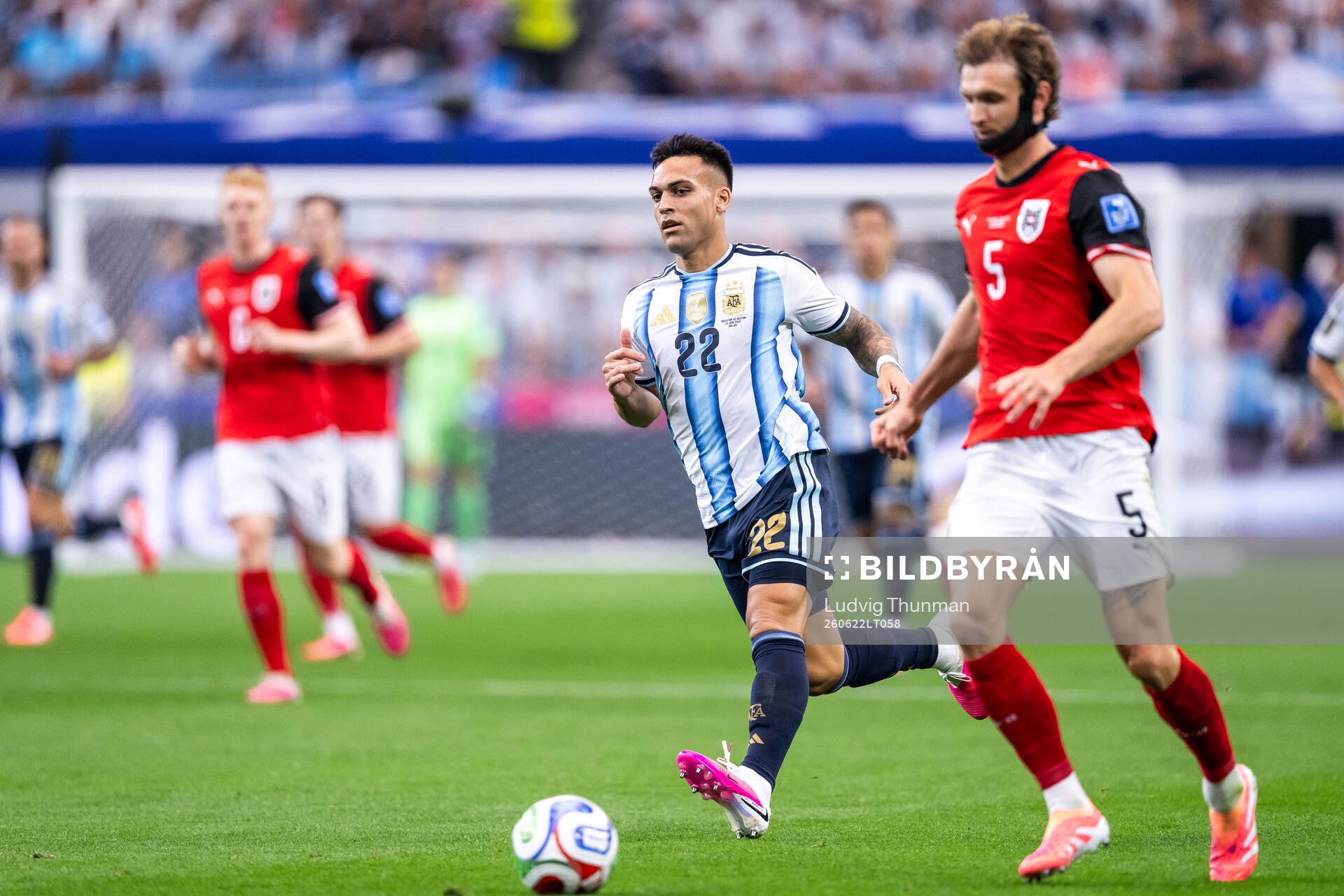Lautaro Martinez of Argentina and Stefan Posch of Austria
