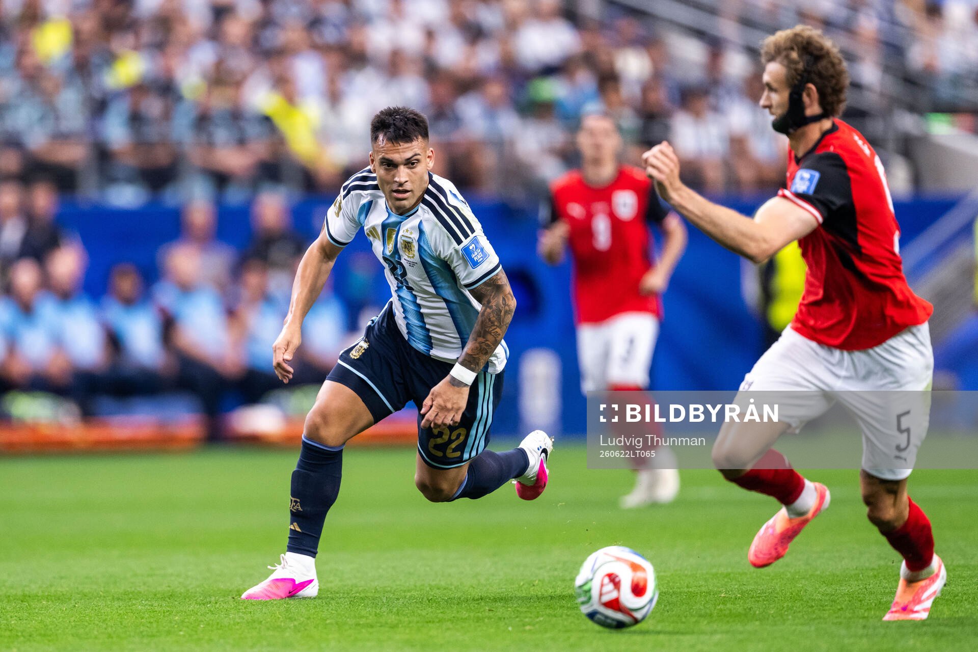 Lautaro Martinez of Argentina and Stefan Posch of Austria