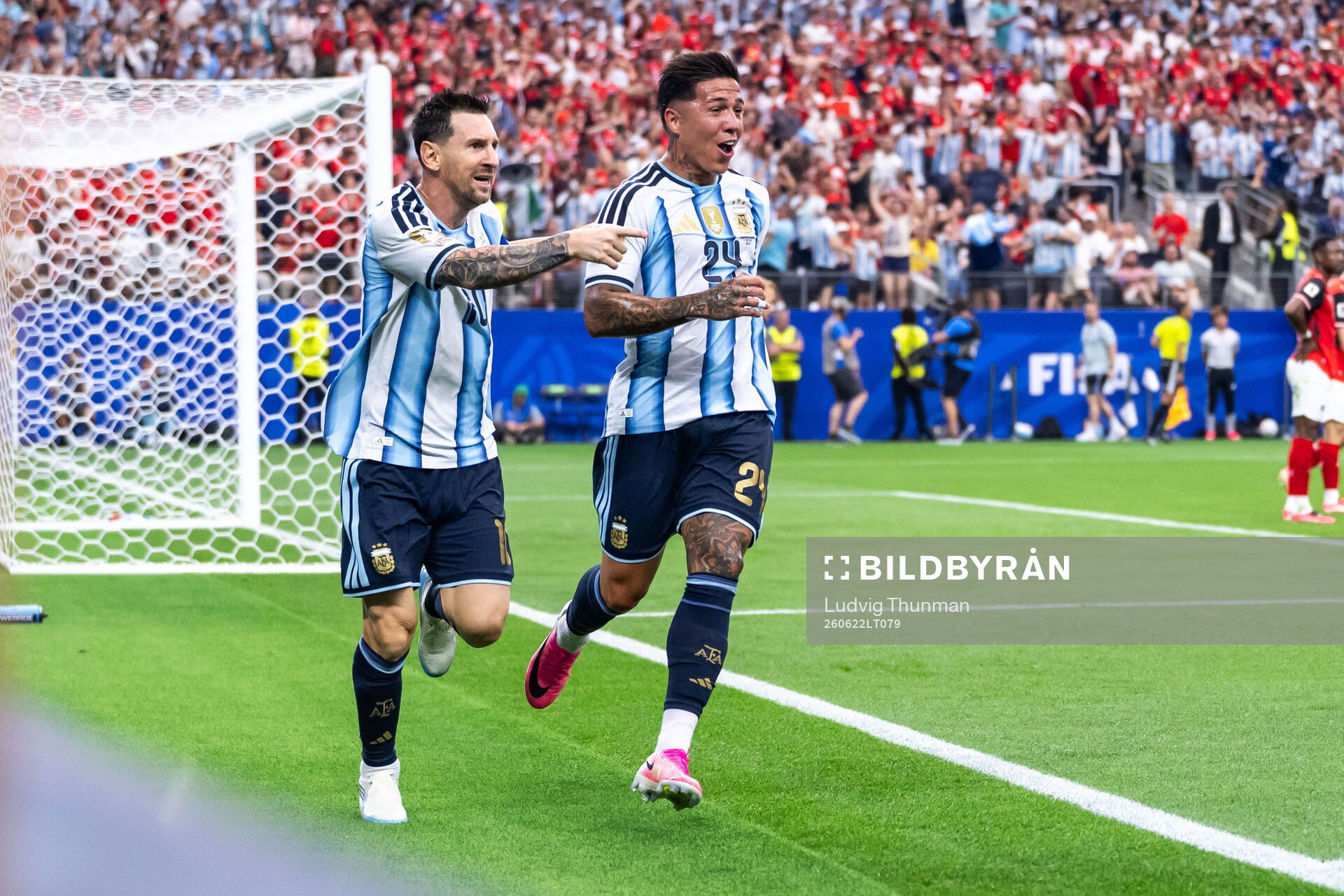 Lionel Messi of Argentina celebrates with Enzo Fernandez