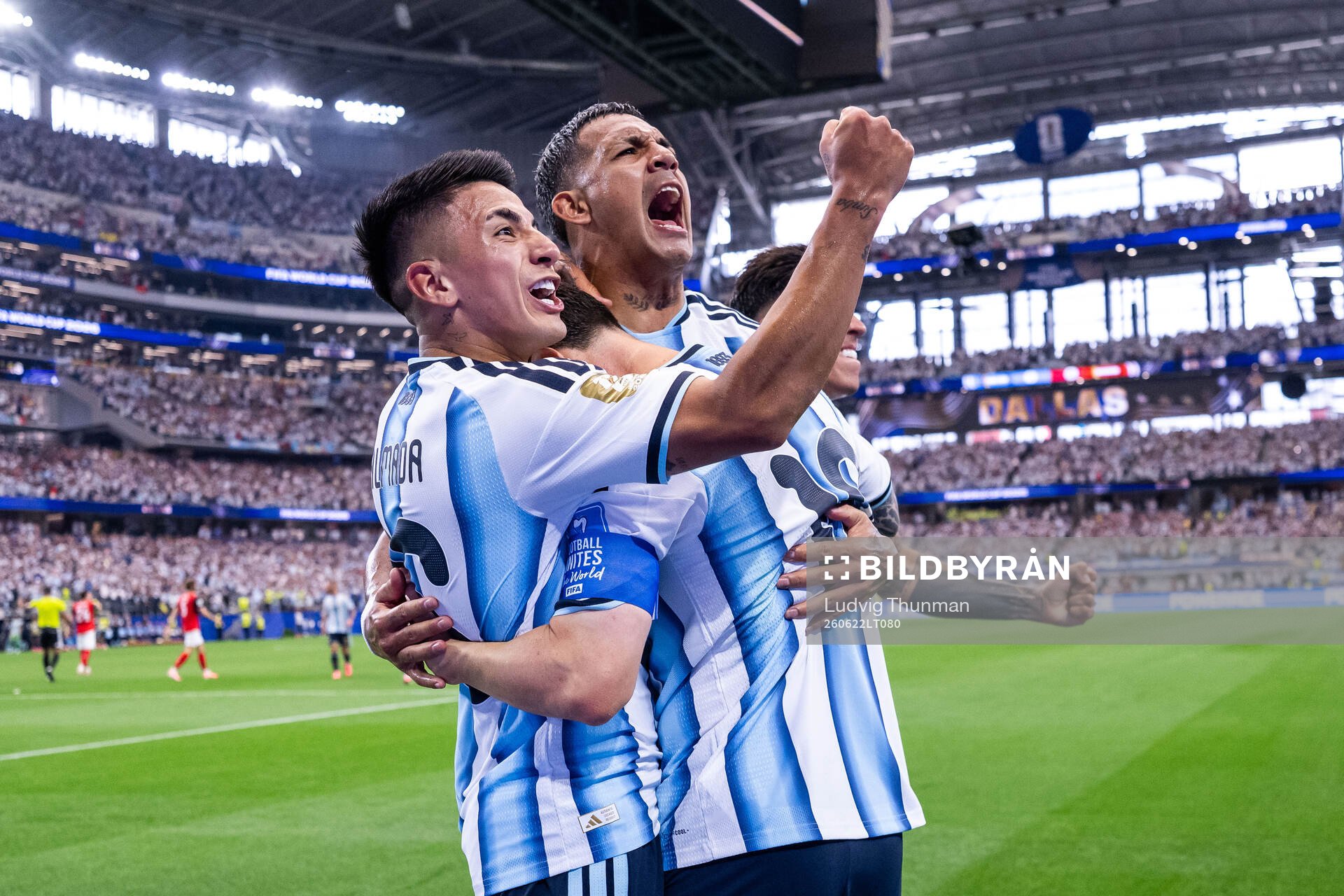 Lionel Messi of Argentina celebrates with Enzo Fernandez