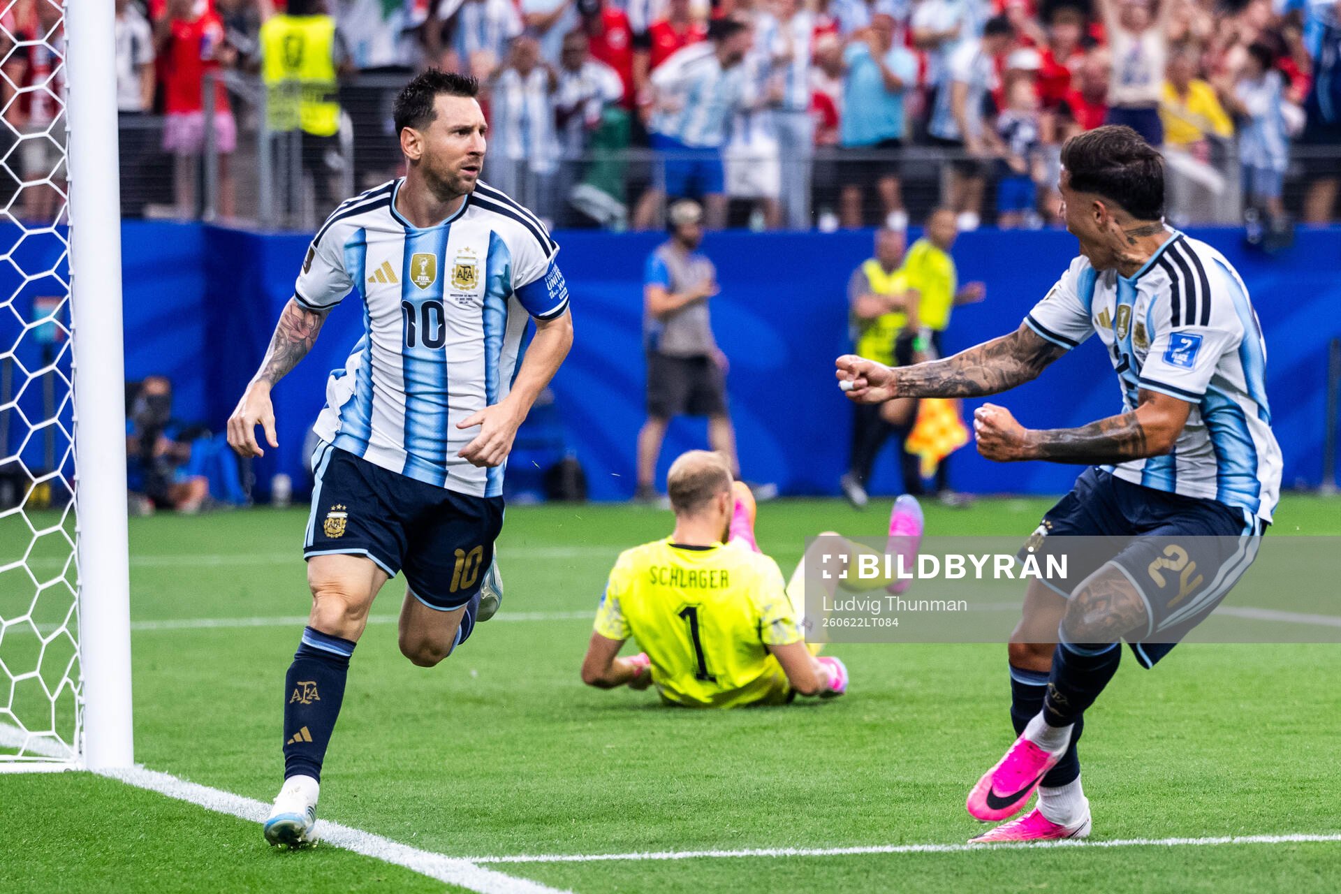 Lionel Messi of Argentina celebrates with Enzo Fernandez