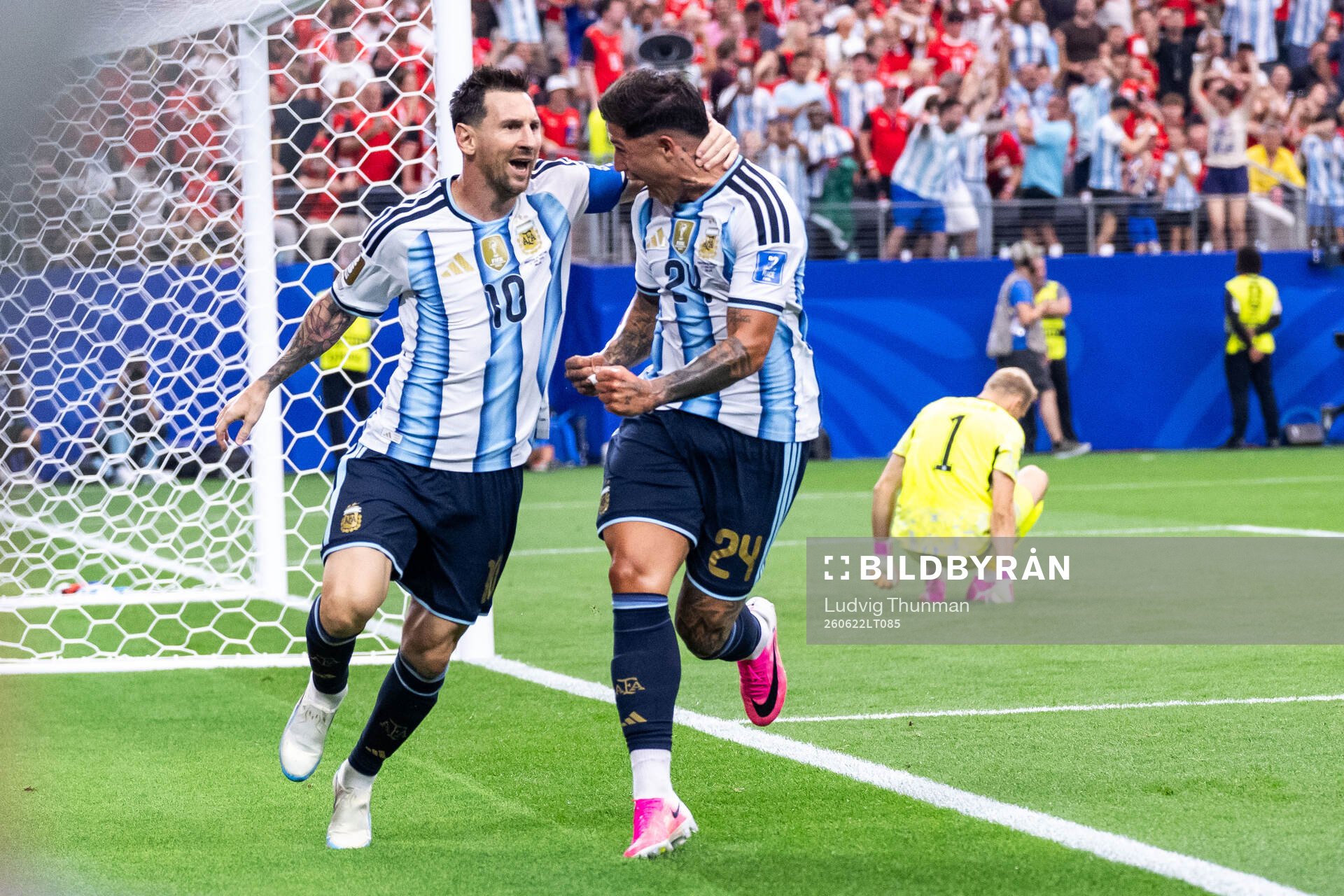 Lionel Messi of Argentina celebrates with Enzo Fernandez