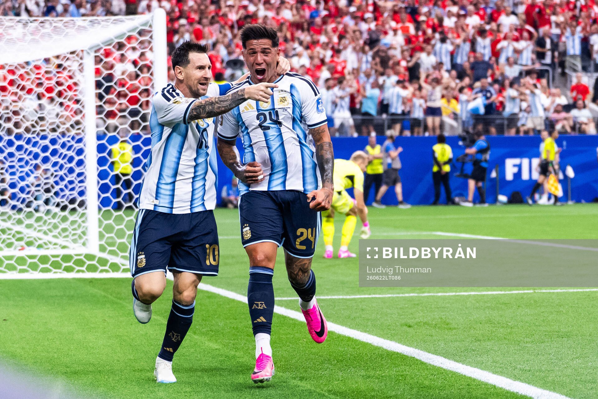 Lionel Messi of Argentina celebrates with Enzo Fernandez