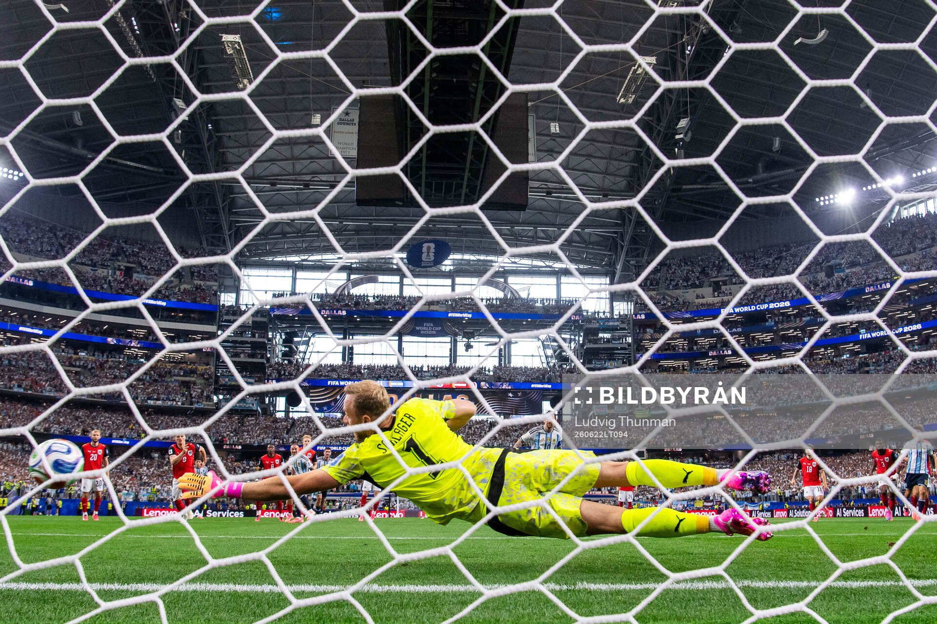 Goalkeeper Alexander Schlager of Austria saves a penalty