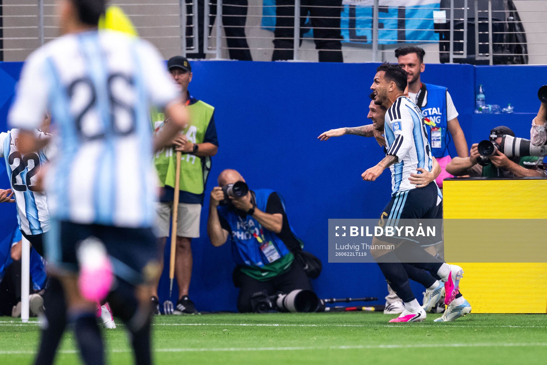 Lionel Messi of Argentina celebrates with Leandro Paredes