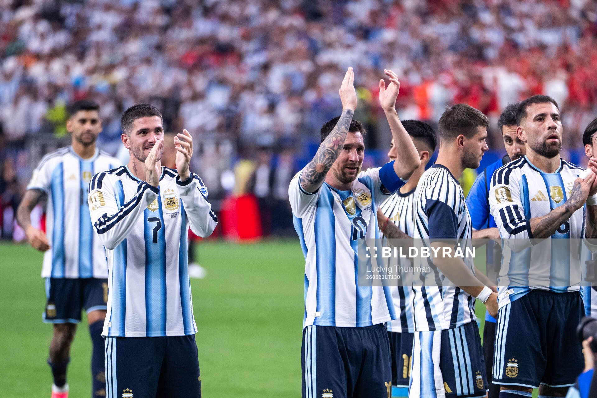 Rodrigo De Paul and Lionel Messi of Argentina