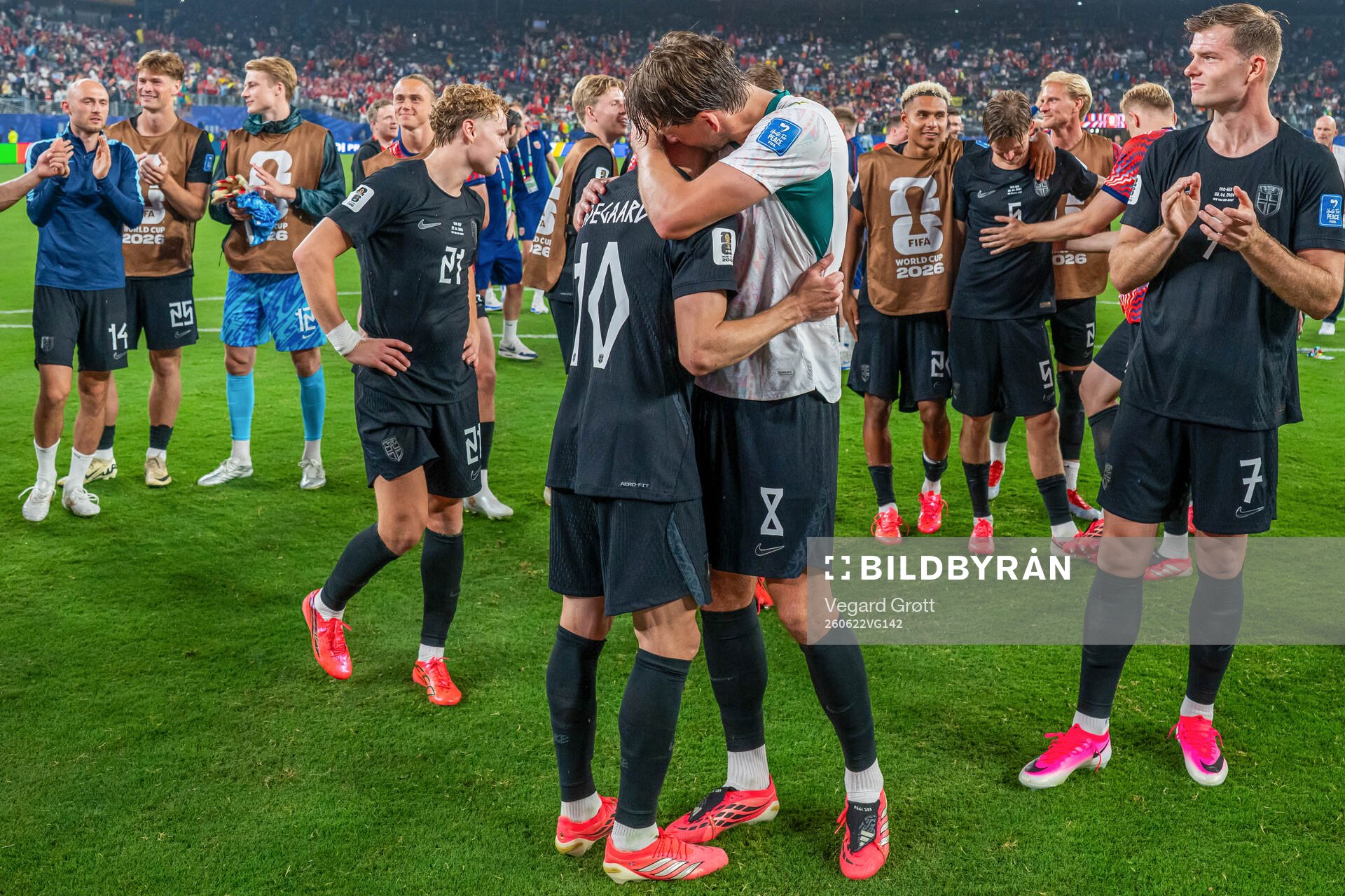 Martin Ødegaard and Sander Berge of Norway celebrate