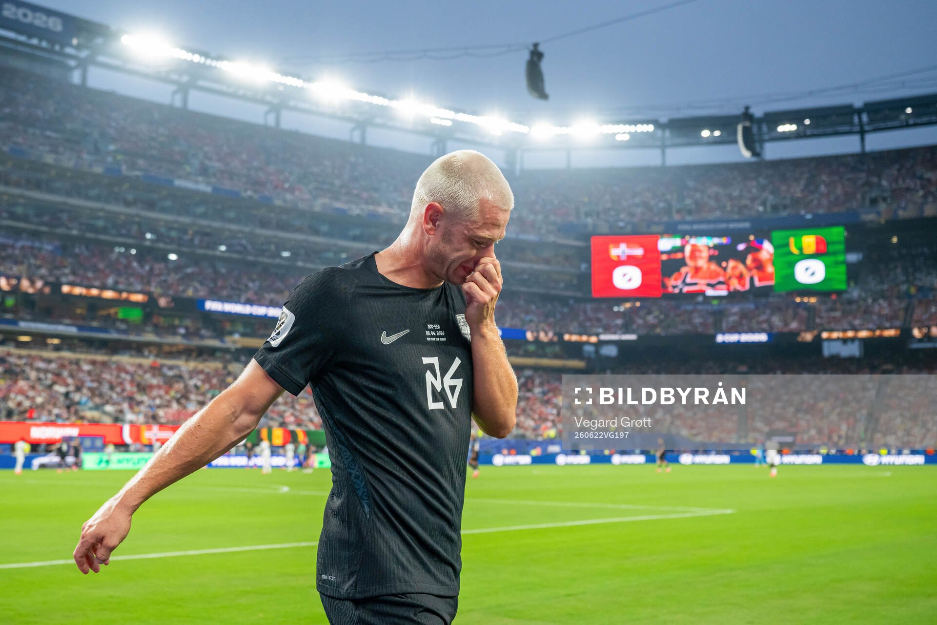 Julian Ryerson of Norway walks off with an injury