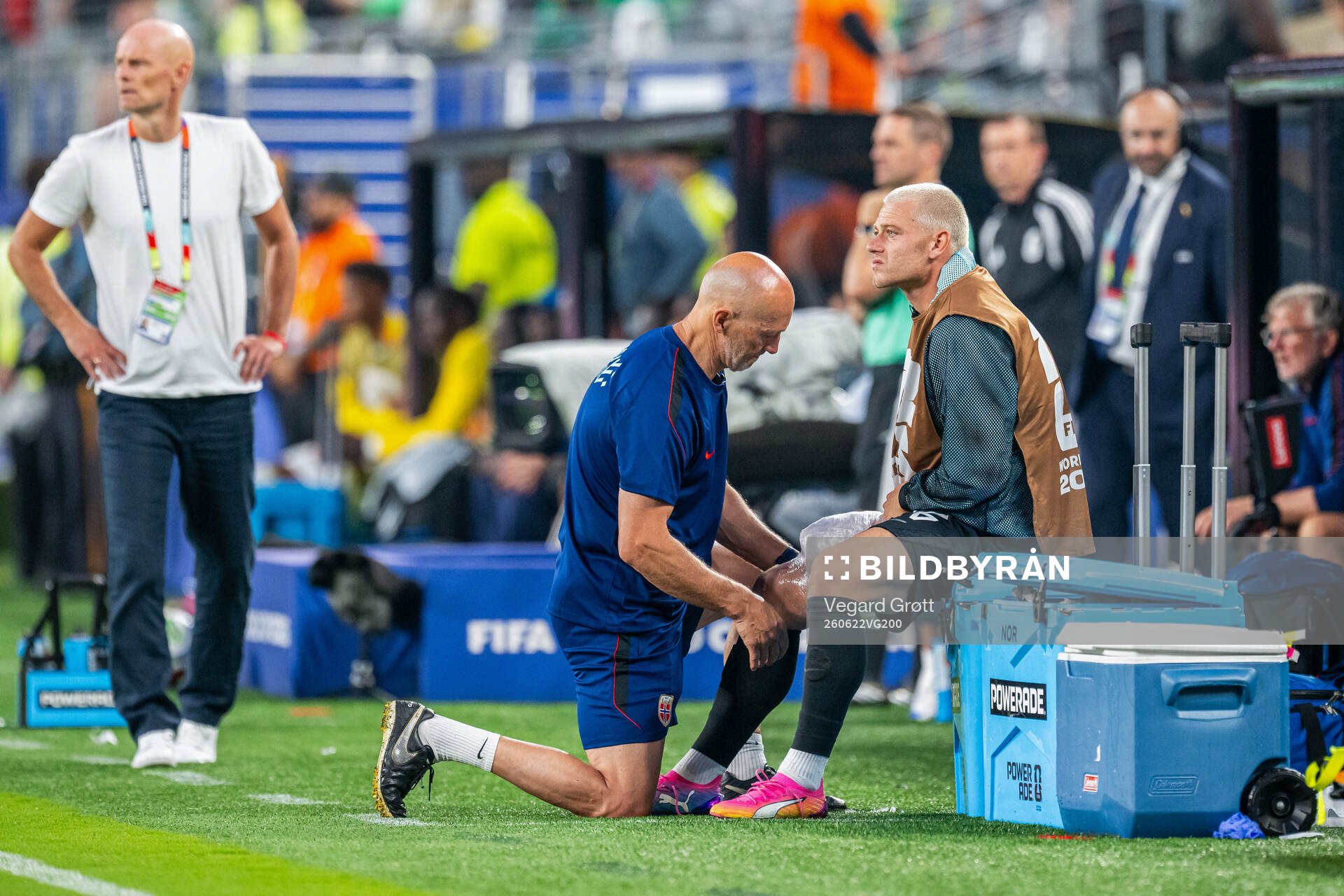 Julian Ryerson of Norway receives treatment from manual