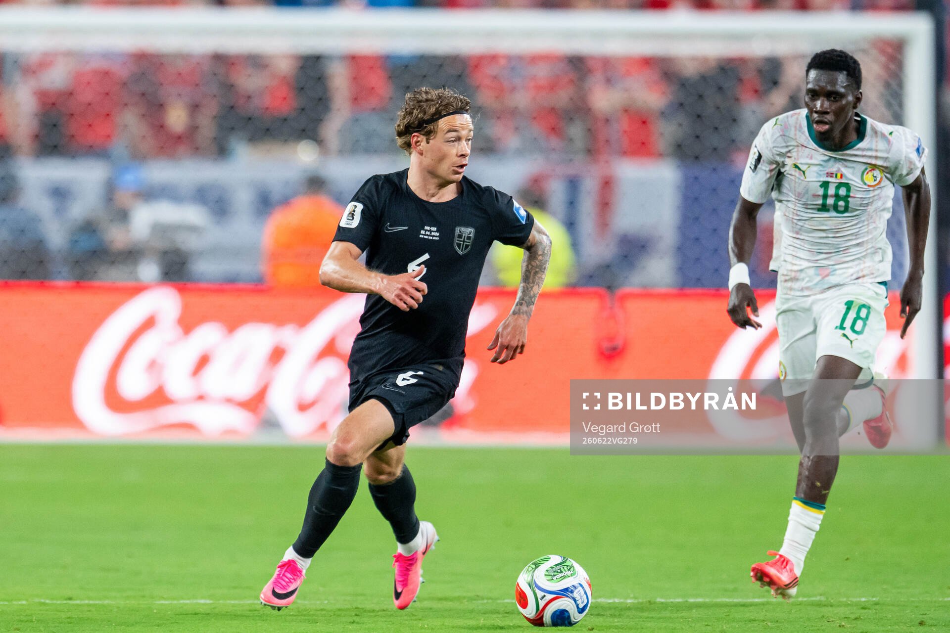 Patrick Berg of Norway and Ismaila Sarr of Senegal