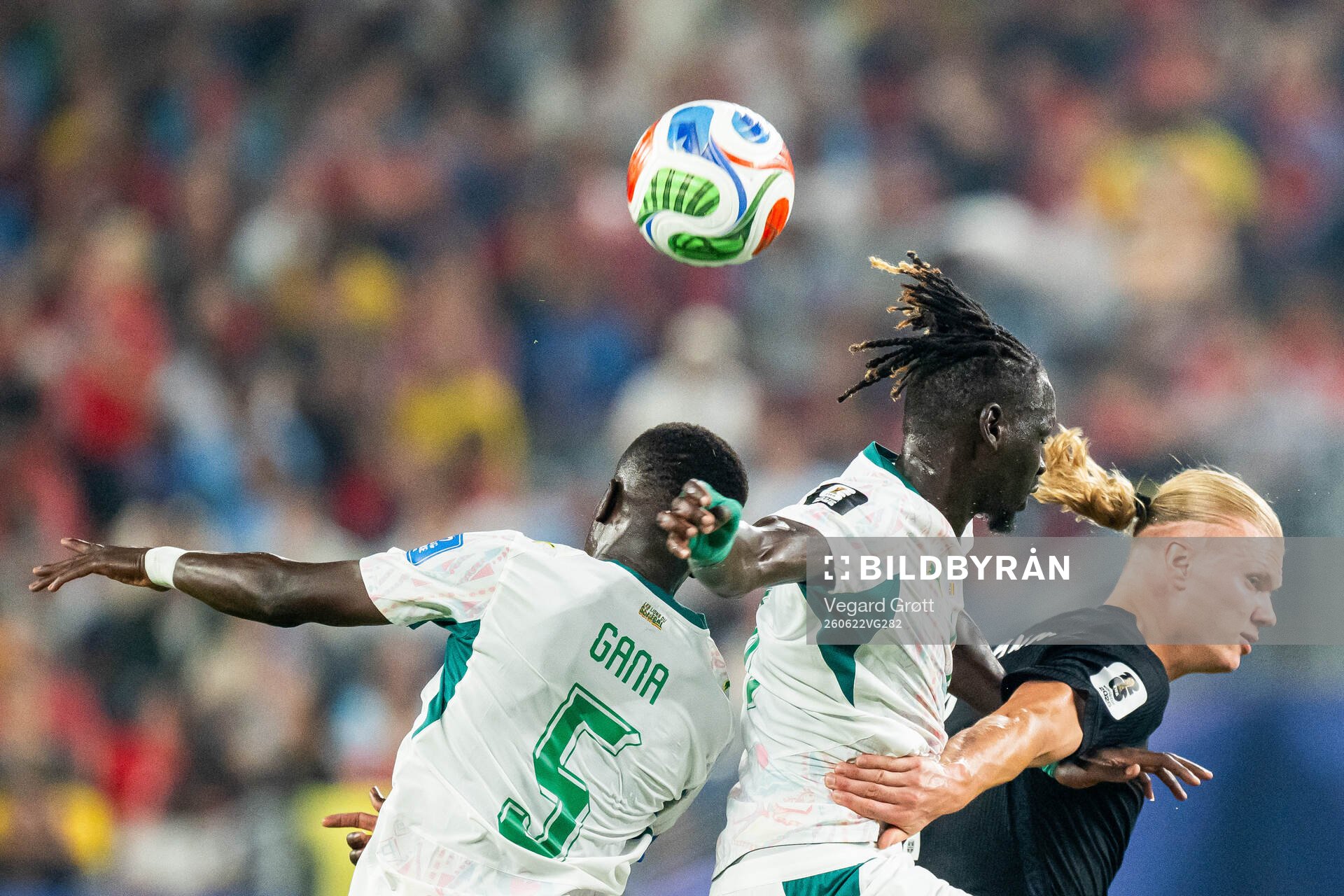 Idrissa Gana Gueye of Senegal and Erling Braut Haaland of