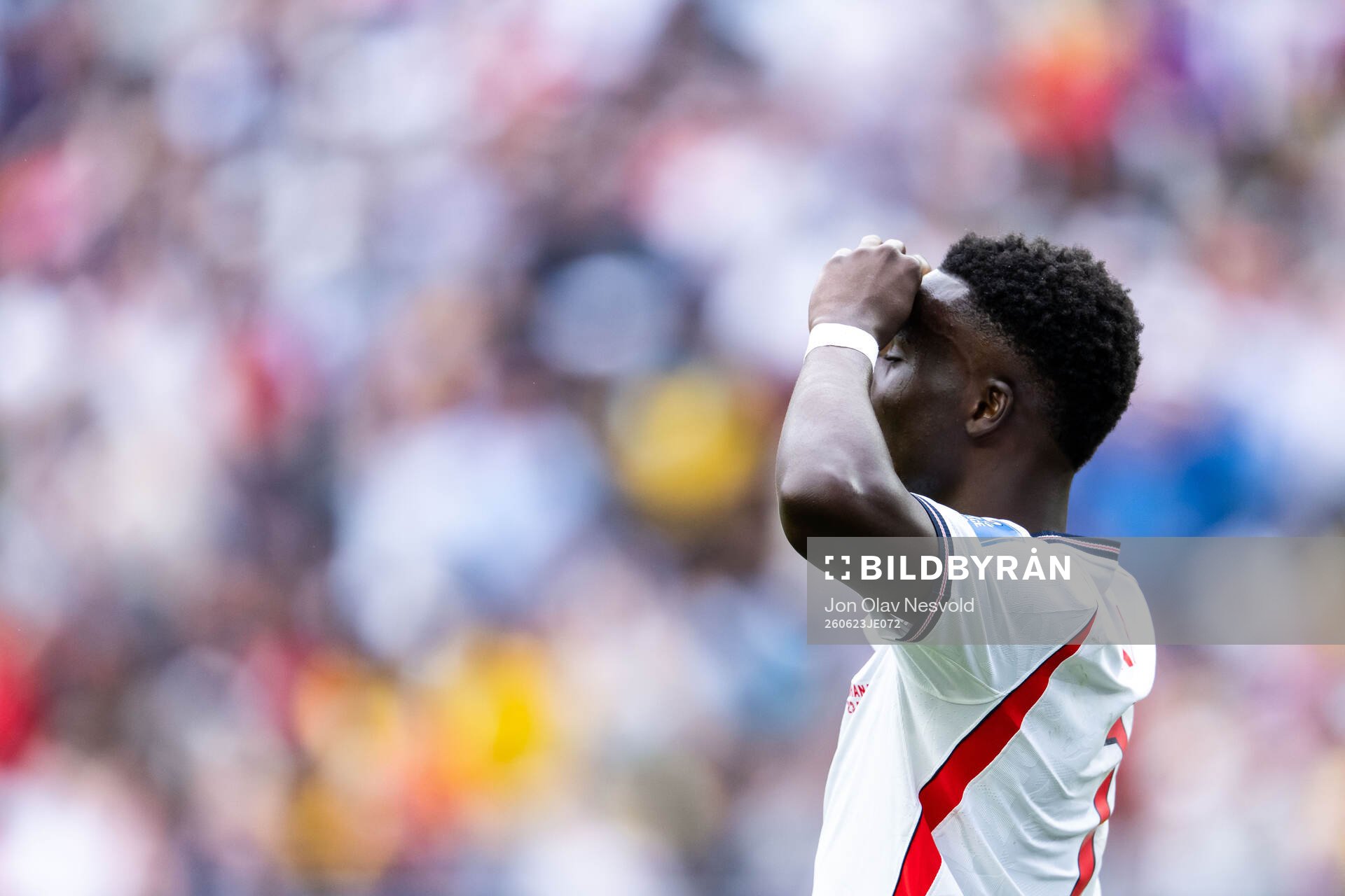 Bukayo Saka of England looks dejected