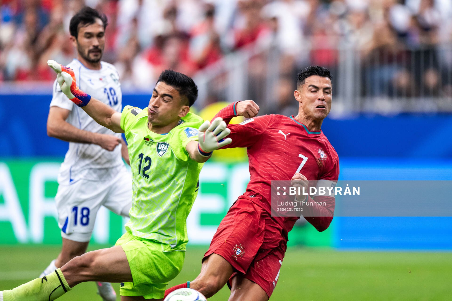goalkeeper Abduvohid Nematov of Uzbekistan and Cristiano