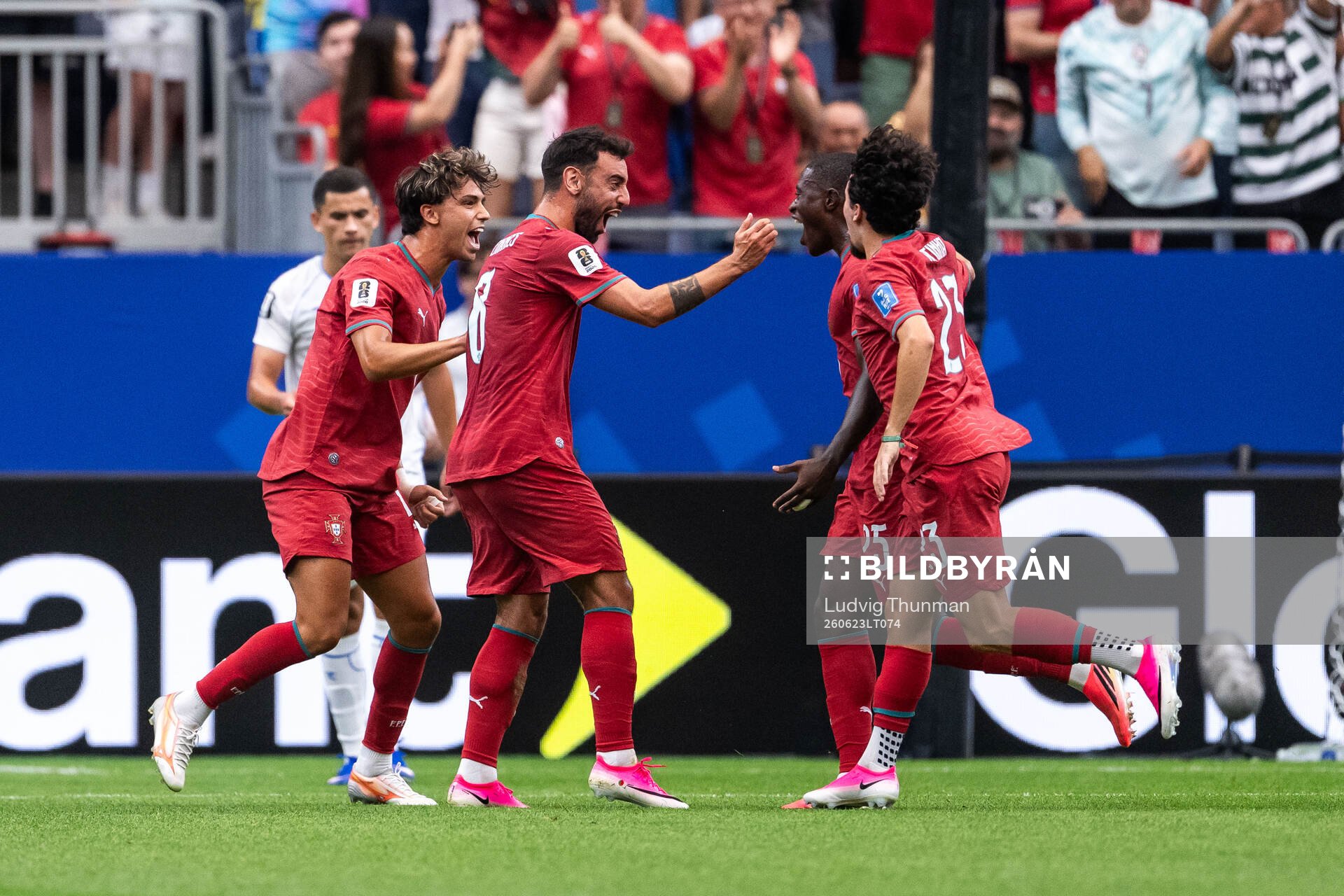 Nuno Mendes of Portugal celebrates with Joao Felix, Bruno