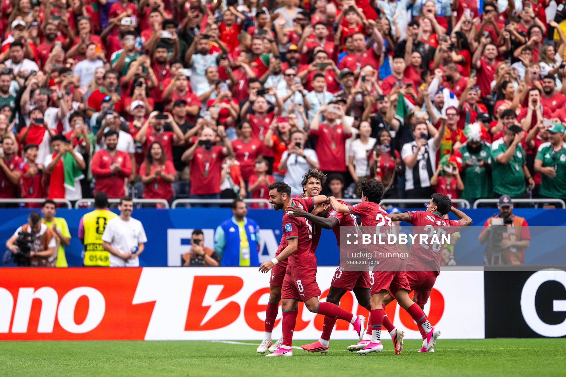 Nuno Mendes of Portugal celebrates with Joao Felix, Bruno
