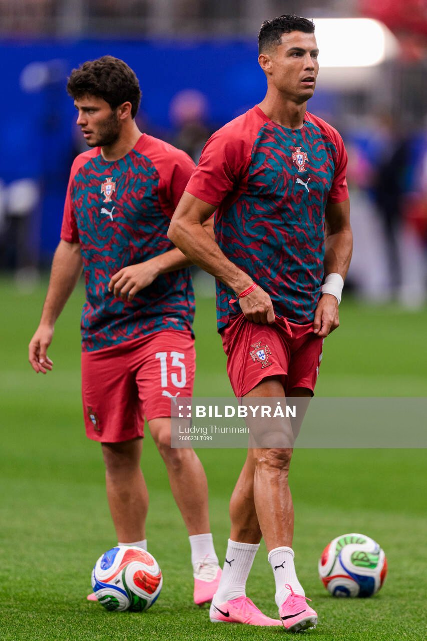 Joao Neves and Cristiano Ronaldo of Portugal