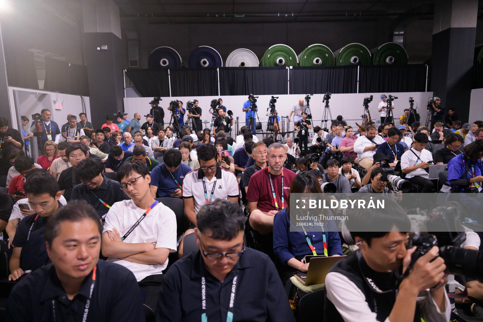 Media at a press conference with Head coach Hajime Moriyasu