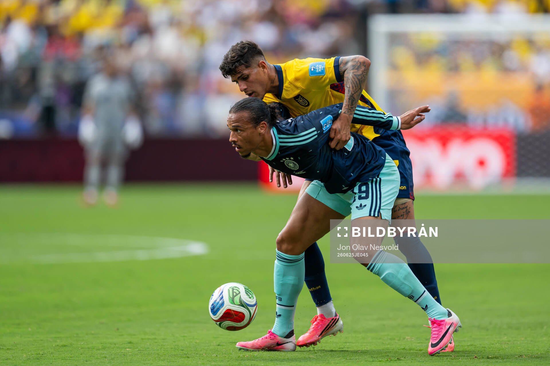 Piero Hincapie of Ecuador and Leroy Sane of Germany