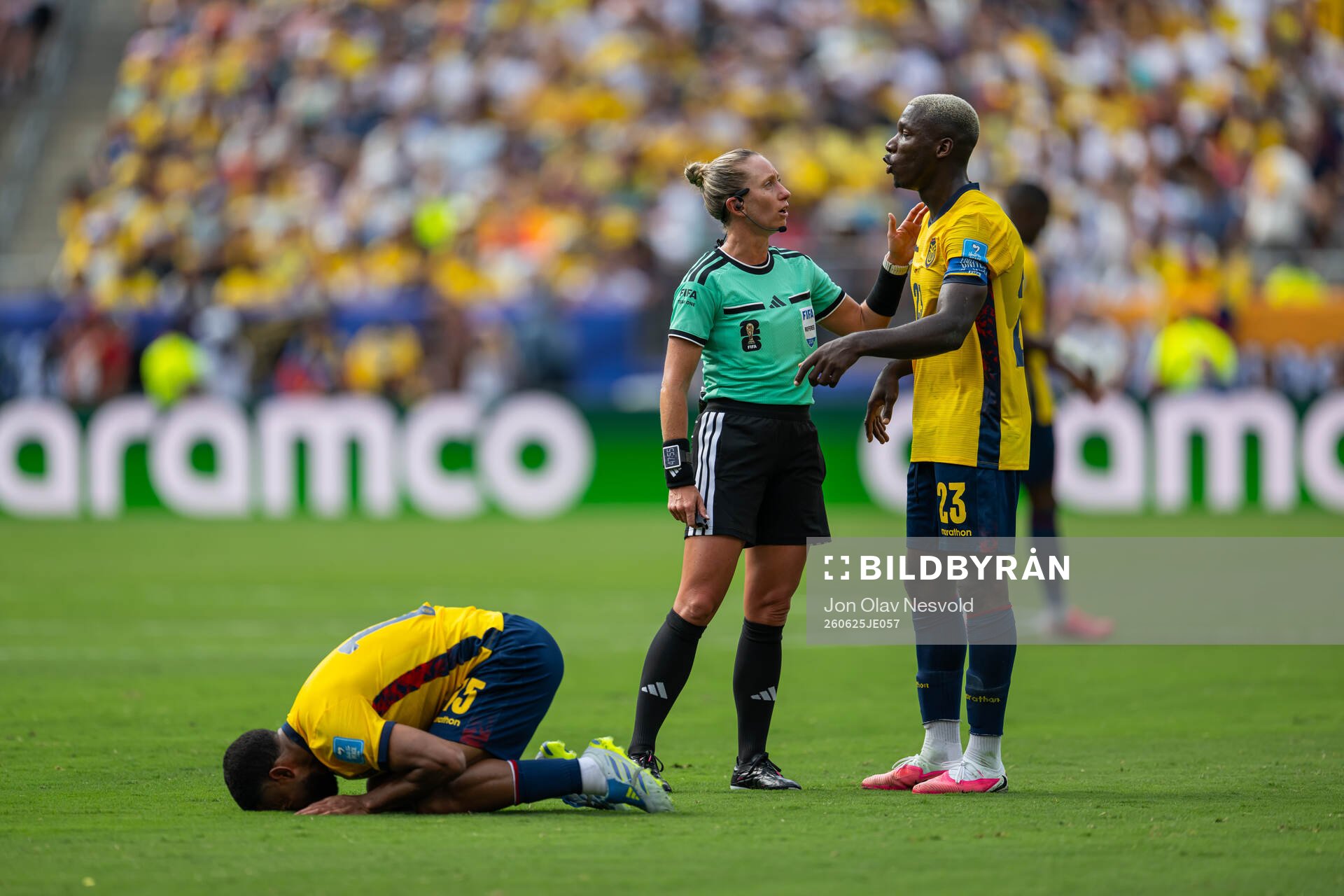 Pedro Vite, Moises Caicedo of Ecuador and referee Tori Penso