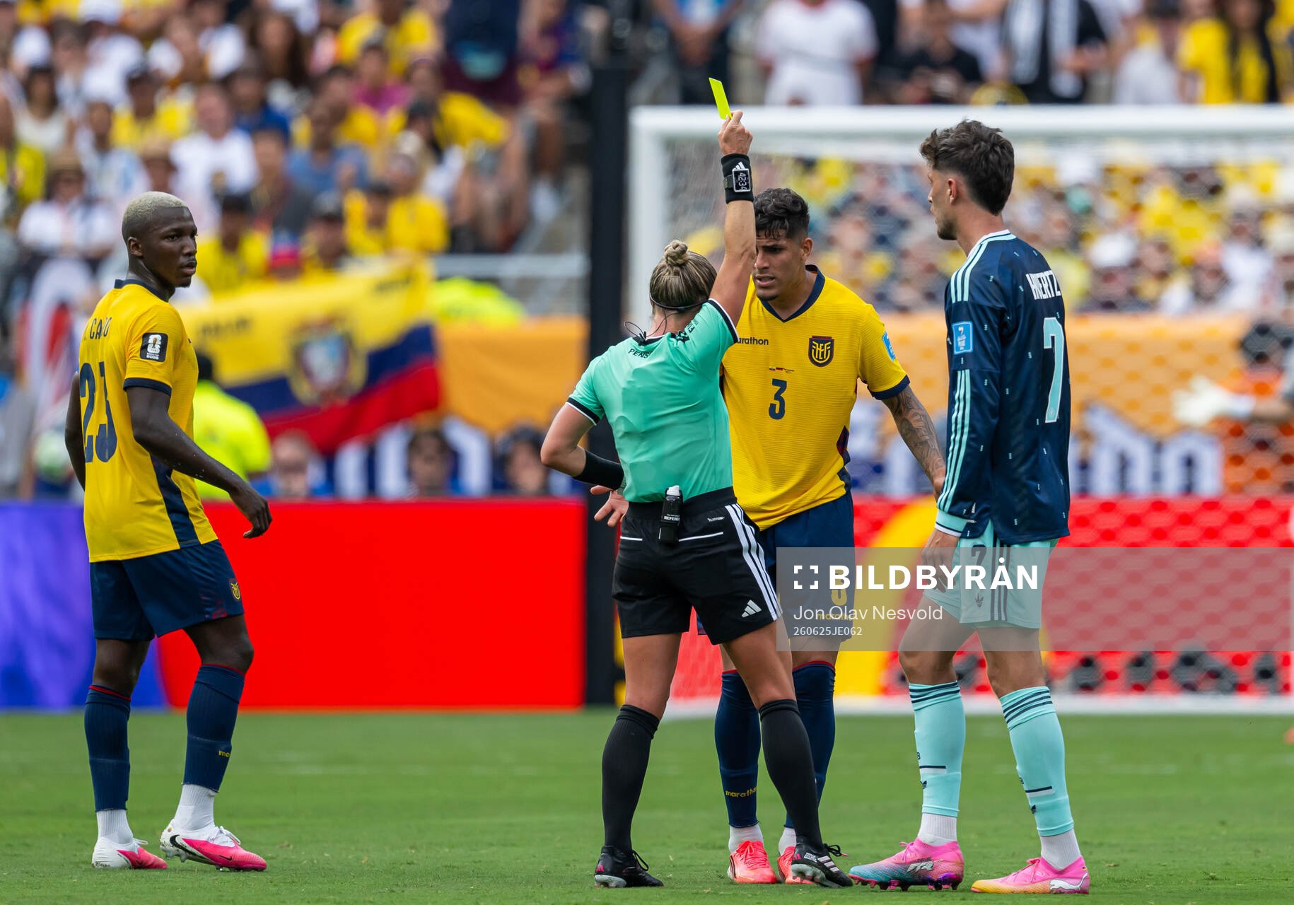 Piero Hincapie of Ecuador receives a warning from referee